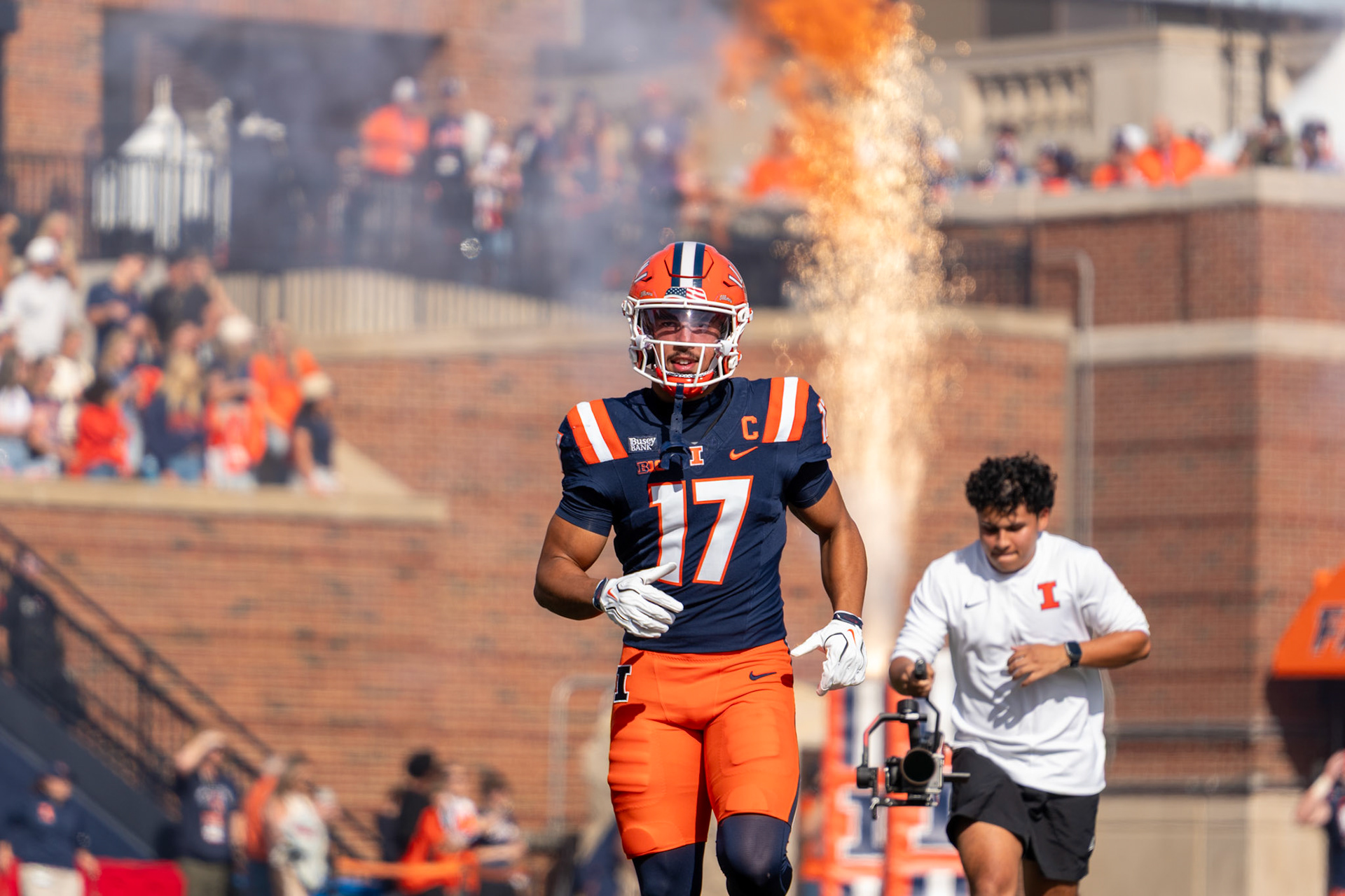 Collin Dixon, senior wide receiver, runs out of the tunnel before Illinois’ game against Oregon at Gies Memorial Stadium on Oct. 24, 2026. Dixon hauled in six receptions for 65 yards and a touchdown in Illinois’ 21-10 victory.