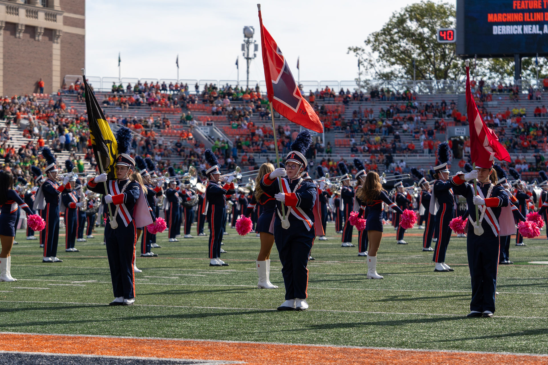 The Marching Illini lines up alongside Big Ten conference flags before Illinois’ game against Oregon at Gies Memorial Stadium on Oct. 24, 2026. The Illini defeated the Ducks 21-10 in front of 58,723 fans.