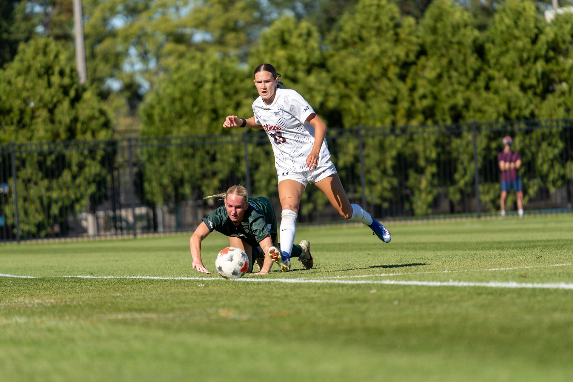 Ashlyn Adams, sophomore forward, races to keep the ball in play against No. 2 Michigan State at Demirjian Park on Oct. 4, 2026. Adams recorded three shots in Illinois' 1-0 loss to the Spartans.