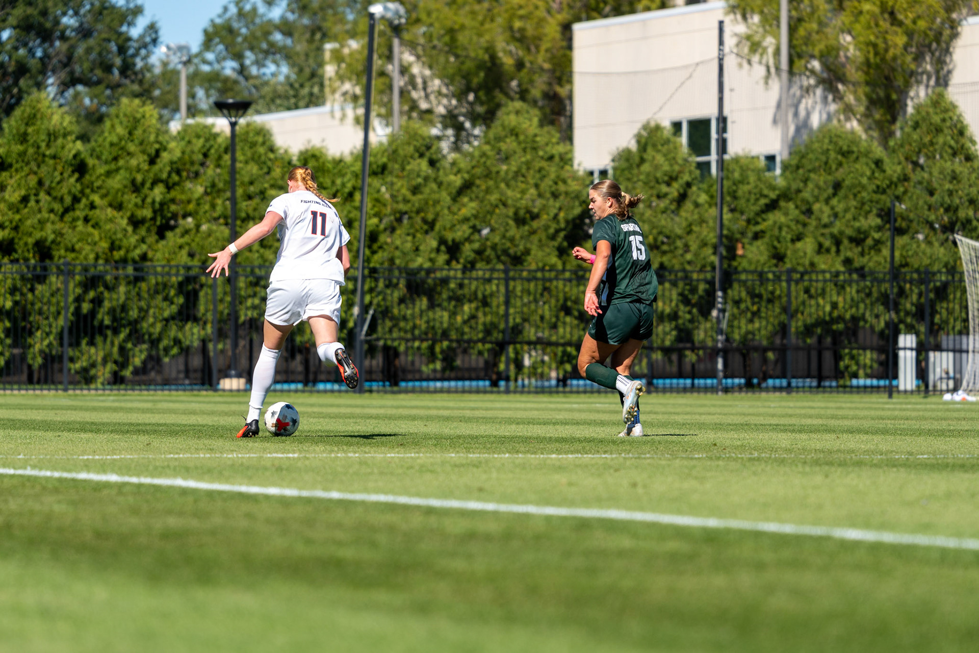 Hedda Ornberg, senior forward, advances the ball with Michigan State defender Julia Belli in pursuit at Demirjian Park on Oct. 4, 2026. Illinois fell 1-0 to No. 2 Michigan State after a late goal in the 85th minute.