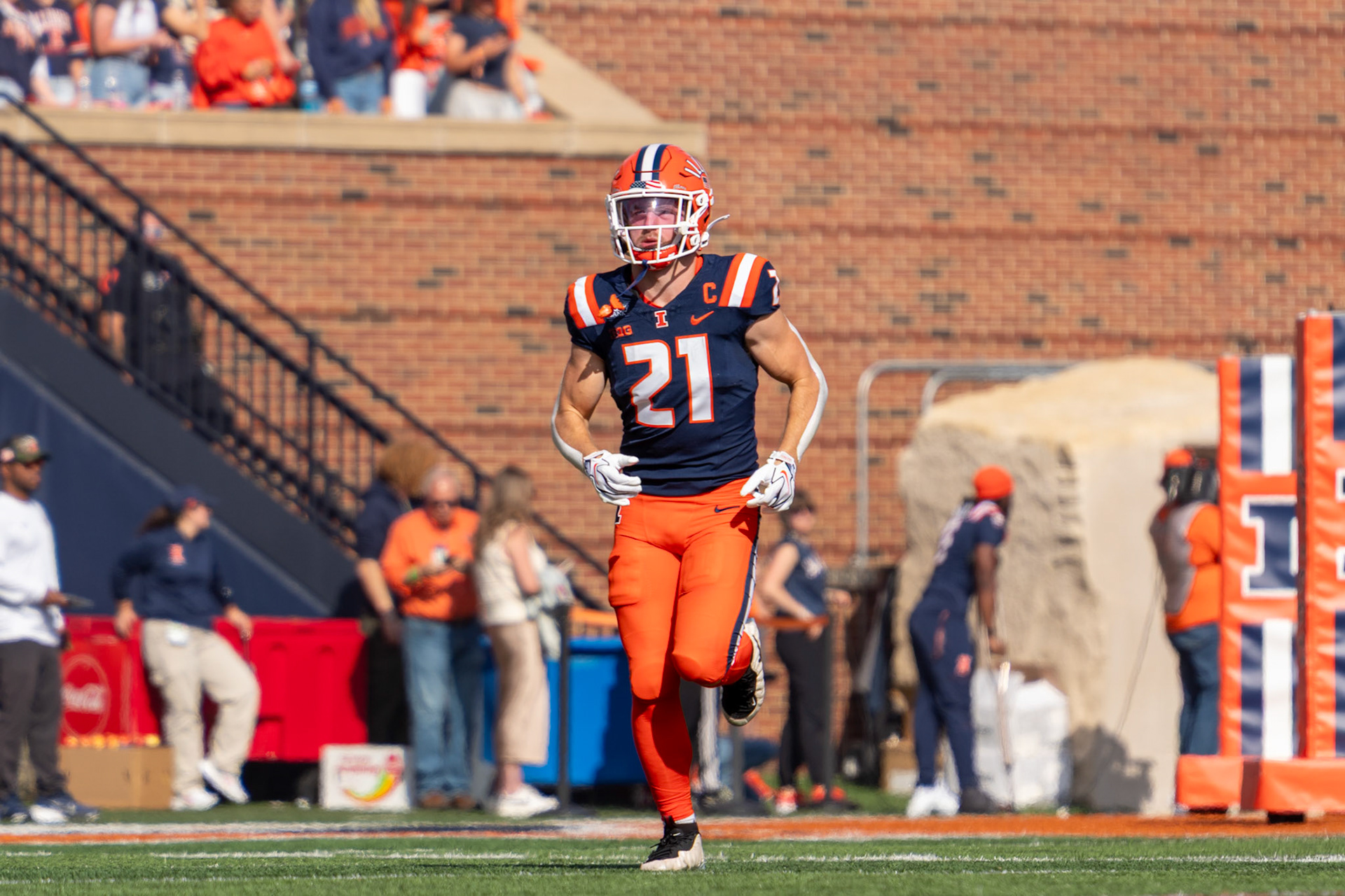 Aidan Laughery, fifth-year running back, runs out of the tunnel before Illinois’ game against Oregon at Gies Memorial Stadium on Oct. 24, 2026. Laughery rushed for a game-high 123 yards and a touchdown in Illinois’ 21-10 victory.