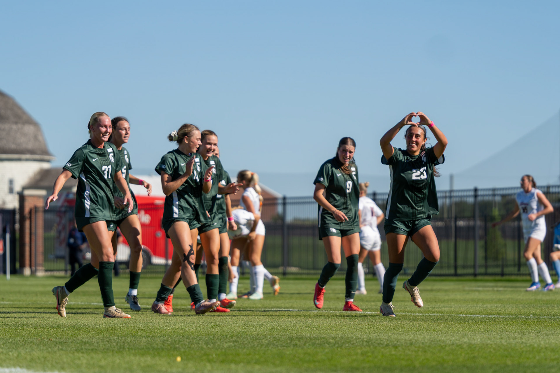 Michigan State midfielder Bella Najera gestures to the crowd after scoring the decisive goal at Demirjian Park on Oct. 4, 2026. Najera's 85th-minute strike lifted No. 2 Michigan State to a 1-0 victory over Illinois.