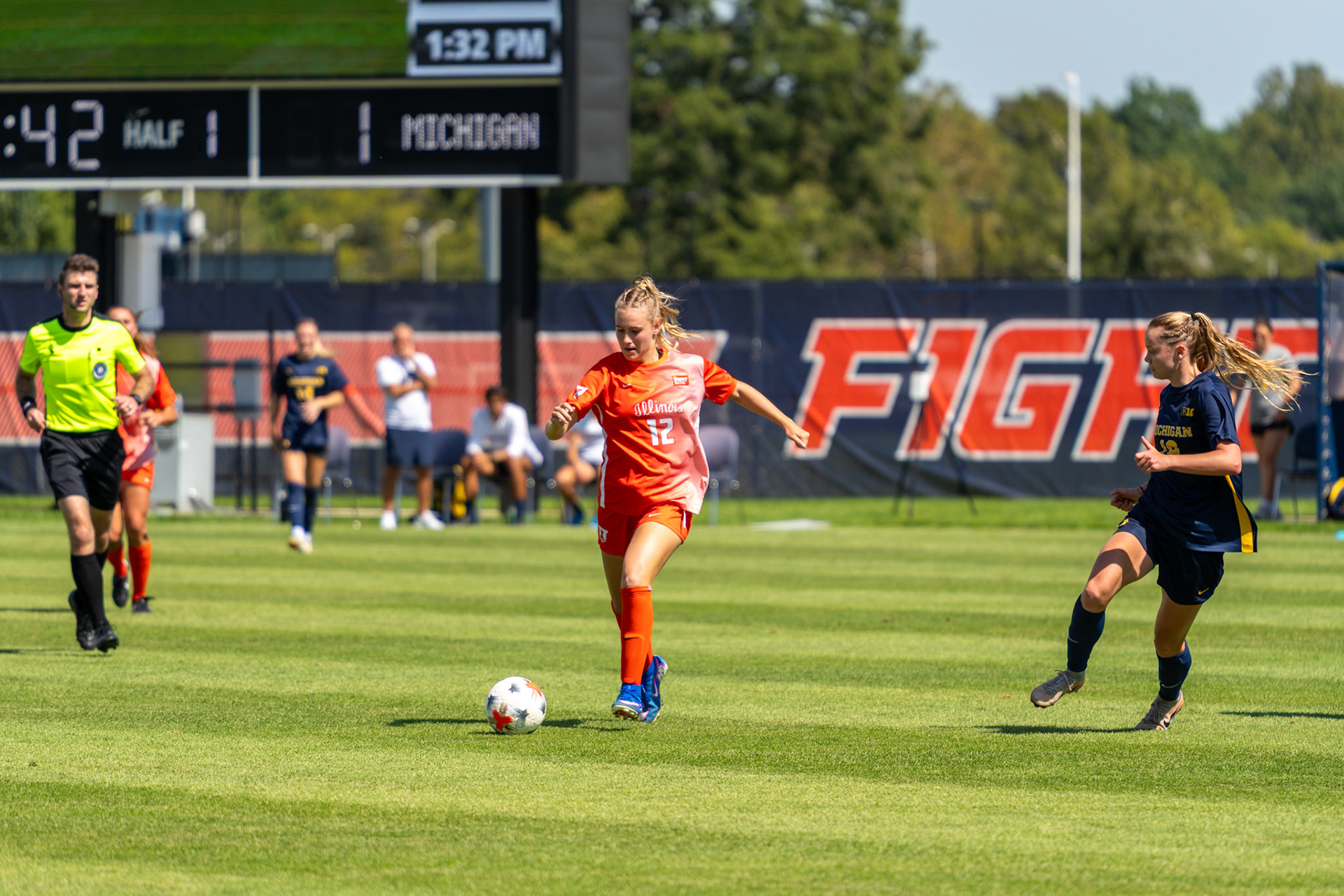 Sophia McMillan, freshman forward/midfielder, advances the ball past Michigan defenders at Demirjian Park on Sunday. Illinois fell to Michigan 2-0 in the Big Ten matchup.
