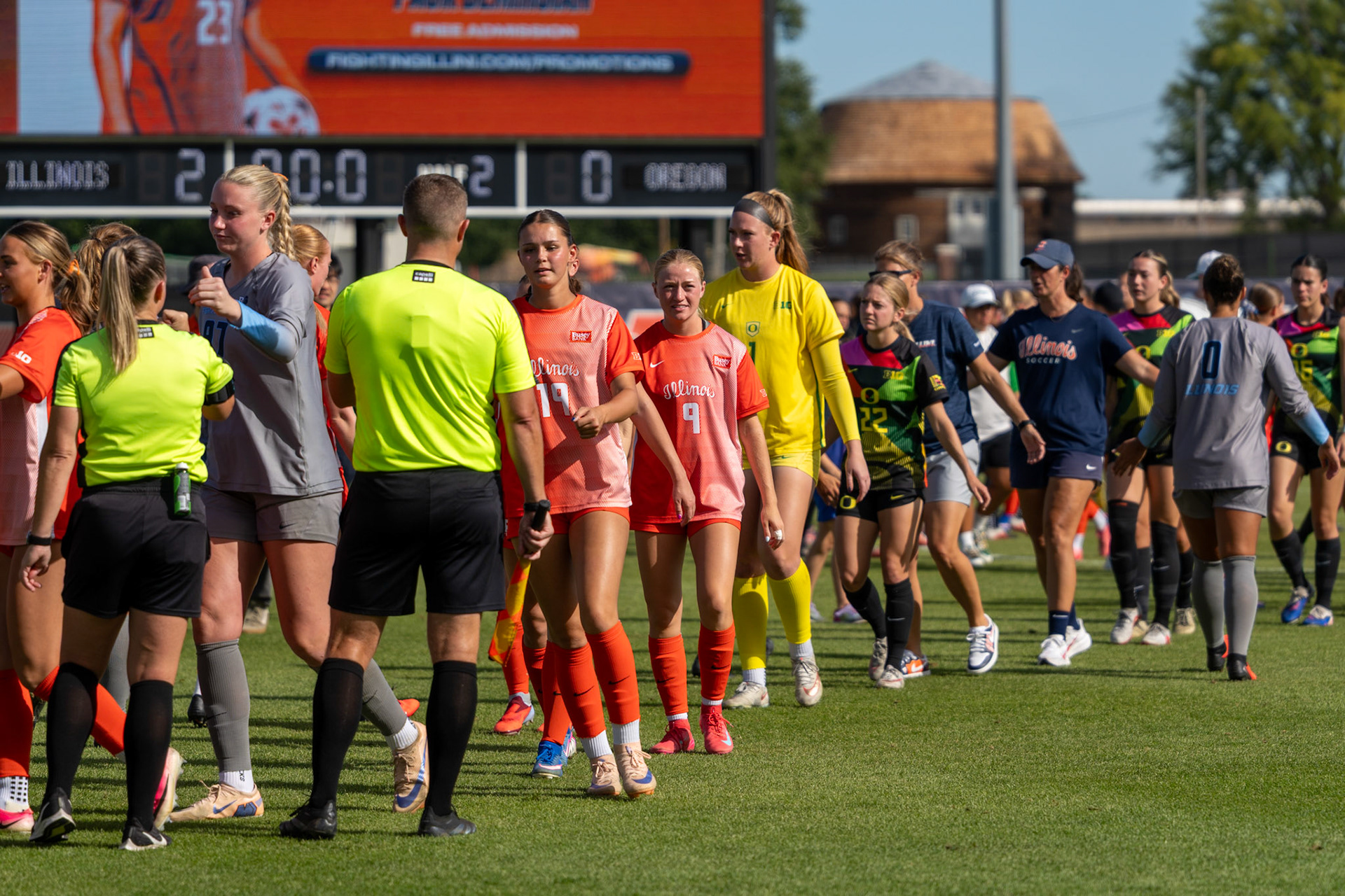 Abby Anderson, freshman forward/midfielder, exchanges a sportsmanship gesture with the referees following Illinois' 2-0 victory over Oregon at Demirjian Park on Sunday. The Illini improved to 4-2-5 overall on the season with the win.