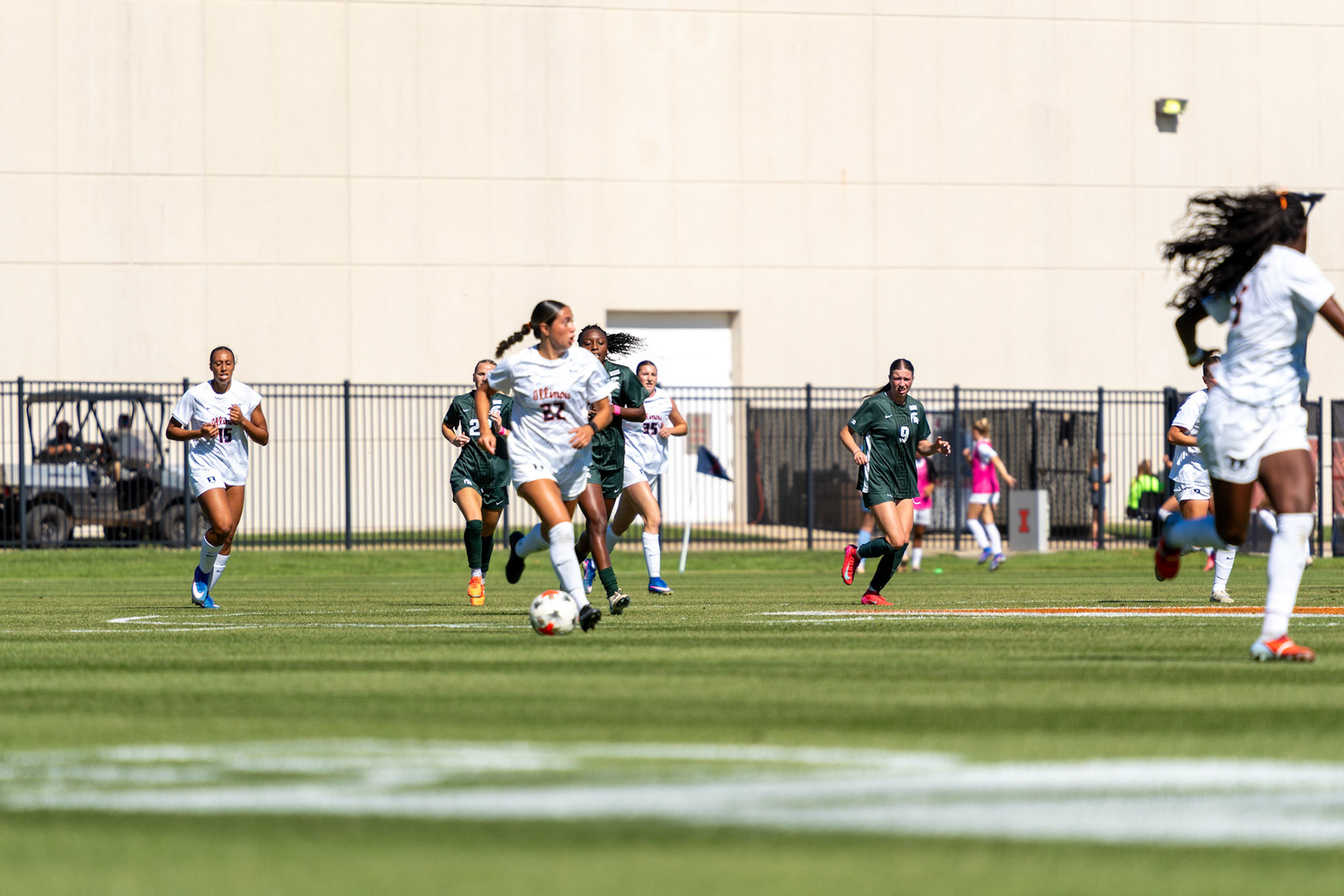 Alyssa White, junior midfielder, surveys the field after winning the ball against No. 2 Michigan State at Demirjian Park on Oct. 4, 2026. Illinois fell 1-0 to the Spartans after a late goal in the 85th minute.
