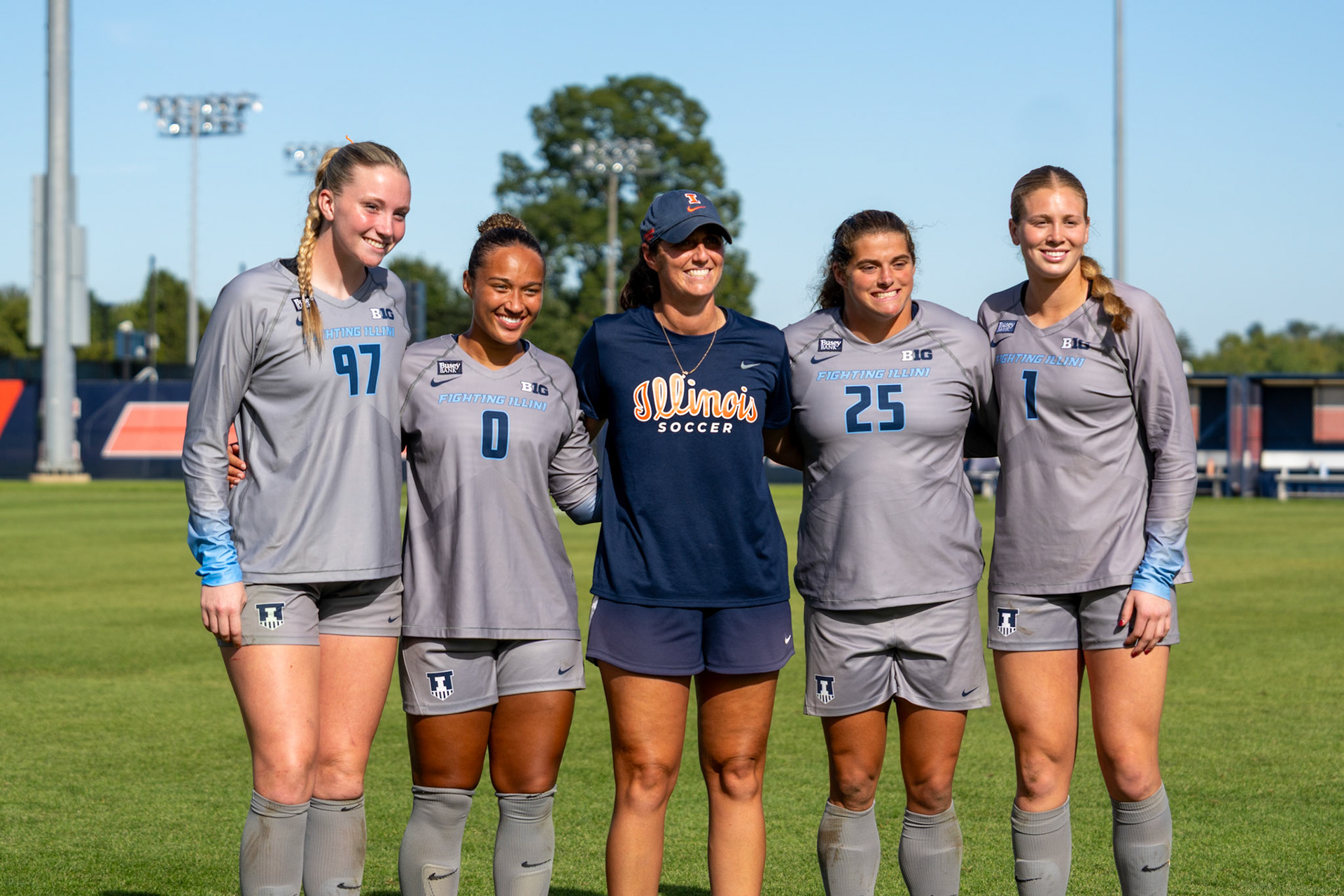 Ashley Smith, Peyton Rhodes, Cailynn Junk and Izzy Lee pose for a photo at Demirjian Park on Sunday. Illinois defeated Oregon 2-0 on Senior Night to improve to 4-2-5 overall on the season.