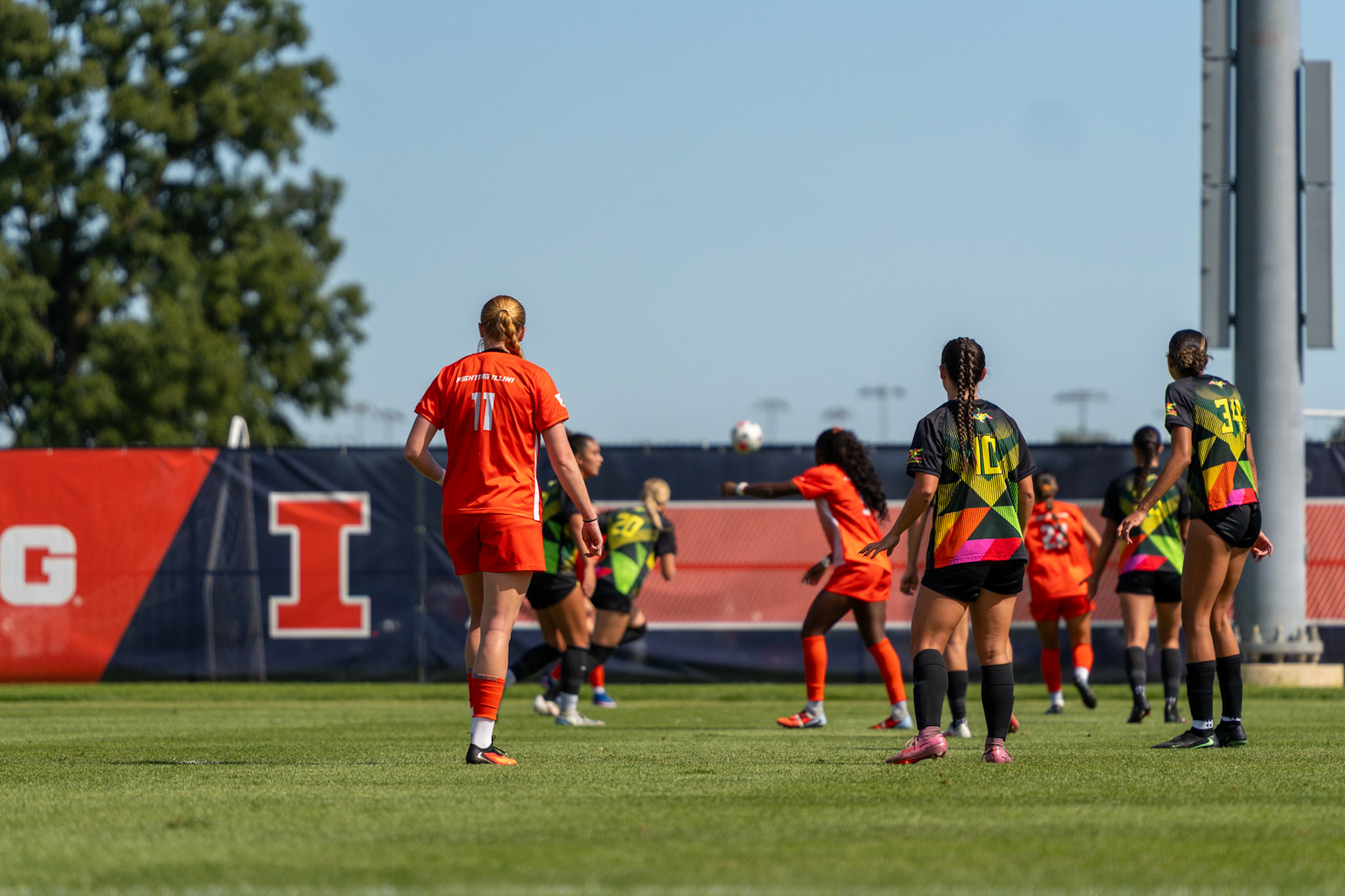 Illinois and Oregon players track an incoming ball at Demirjian Park on Sunday. The Illini defeated the Ducks 2-0 on Senior Night to improve to 4-2-5 overall on the season.