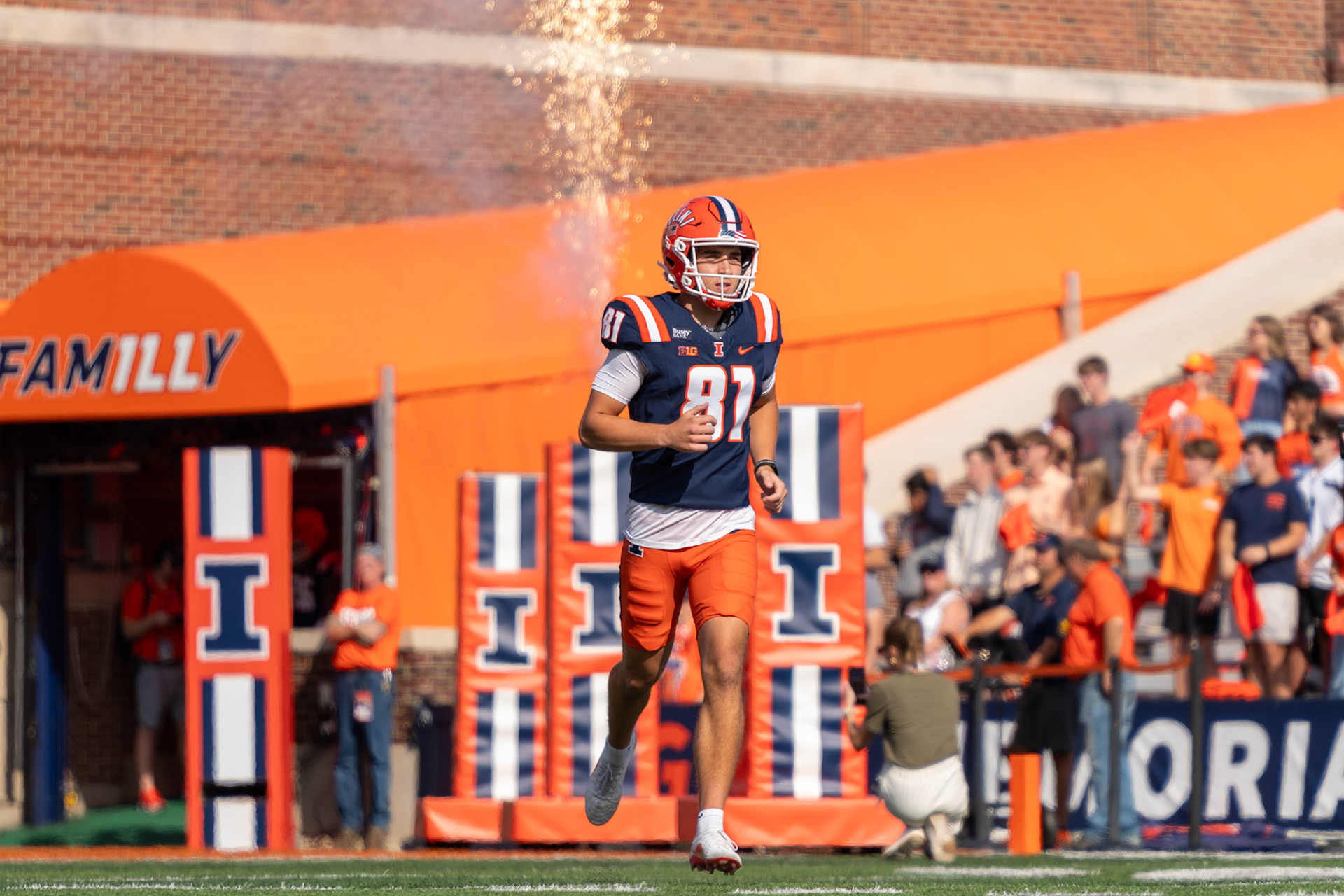 Leslie Mosley Jr., freshman wide receiver, runs out of the tunnel before Illinois’ game against Oregon at Gies Memorial Stadium on Oct. 24, 2026. The Illini defeated the Ducks 21-10 to improve to 4-3 on the season.