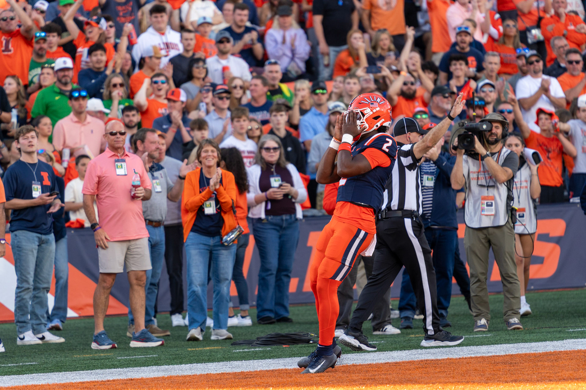 Carson Boyd, sophomore quarterback, celebrates after converting a first down on a quarterback sneak against Oregon at Gies Memorial Stadium on Oct. 24, 2026. Illinois defeated Oregon 21-10 in front of an attendance of 58,723 at Gies Memorial Stadium.