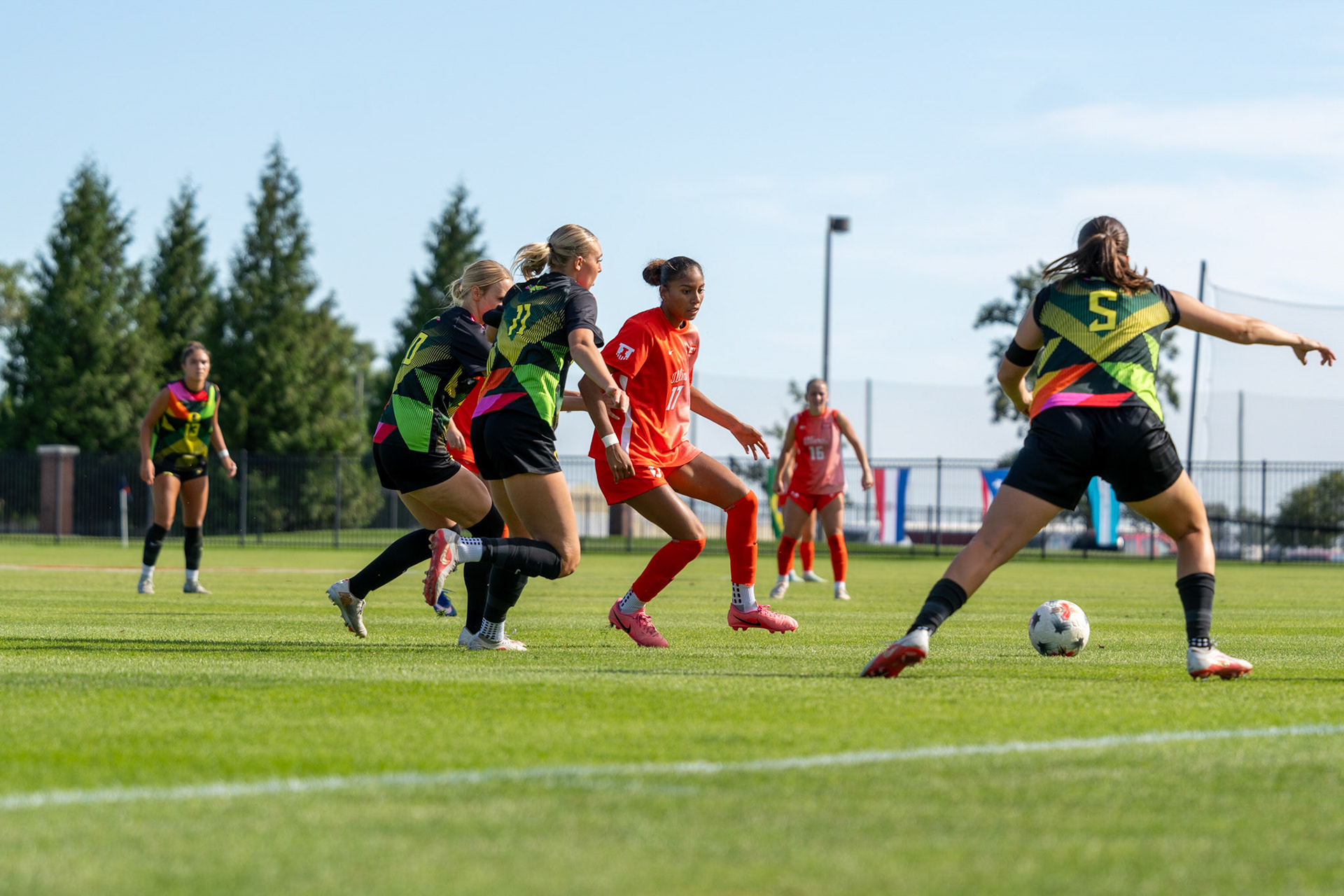 Gabriella Garcia-Terrell, junior forward, dribbles past multiple Oregon defenders at Demirjian Park on Sunday. Garcia-Terrell scored the first goal of the match in the 51st minute to give Illinois a 1-0 lead.