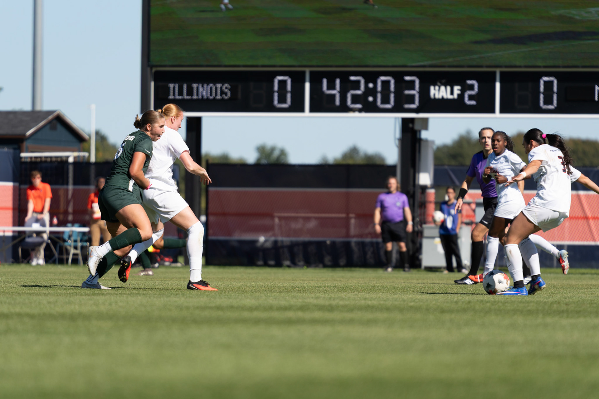 Ava Arengo, senior midfielder, looks to distribute the ball to Hedda Ornberg, senior forward, at Demirjian Park on Oct. 4, 2026. Illinois fell 1-0 to No. 2 Michigan State after a late goal in the 85th minute.