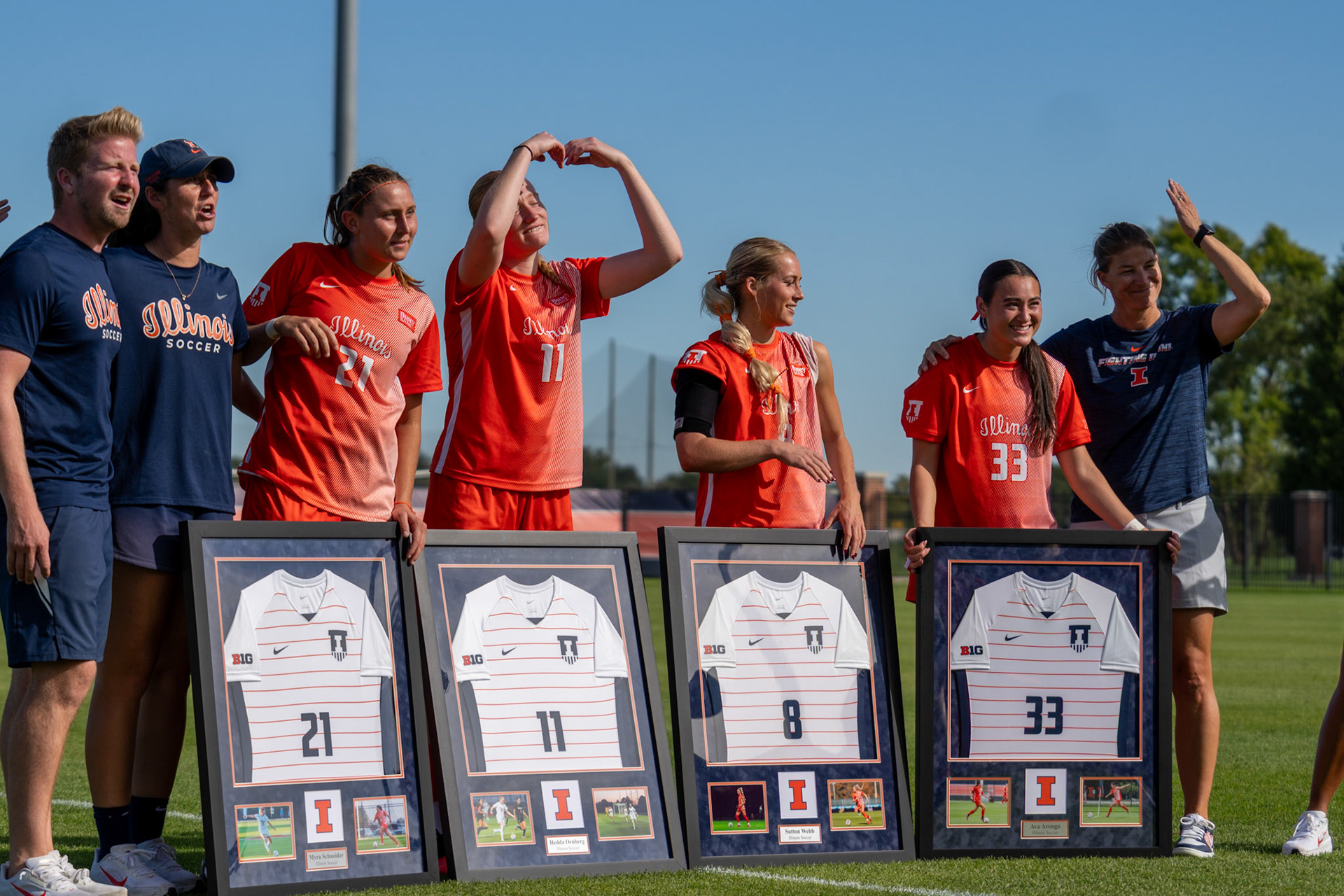 Myra Schneider, Hedda Ornberg, Sutton Webb and Ava Arengo celebrate together following Illinois' 2-0 victory over Oregon at Demirjian Park on Sunday. The four seniors were recognized on Senior Night after the match.