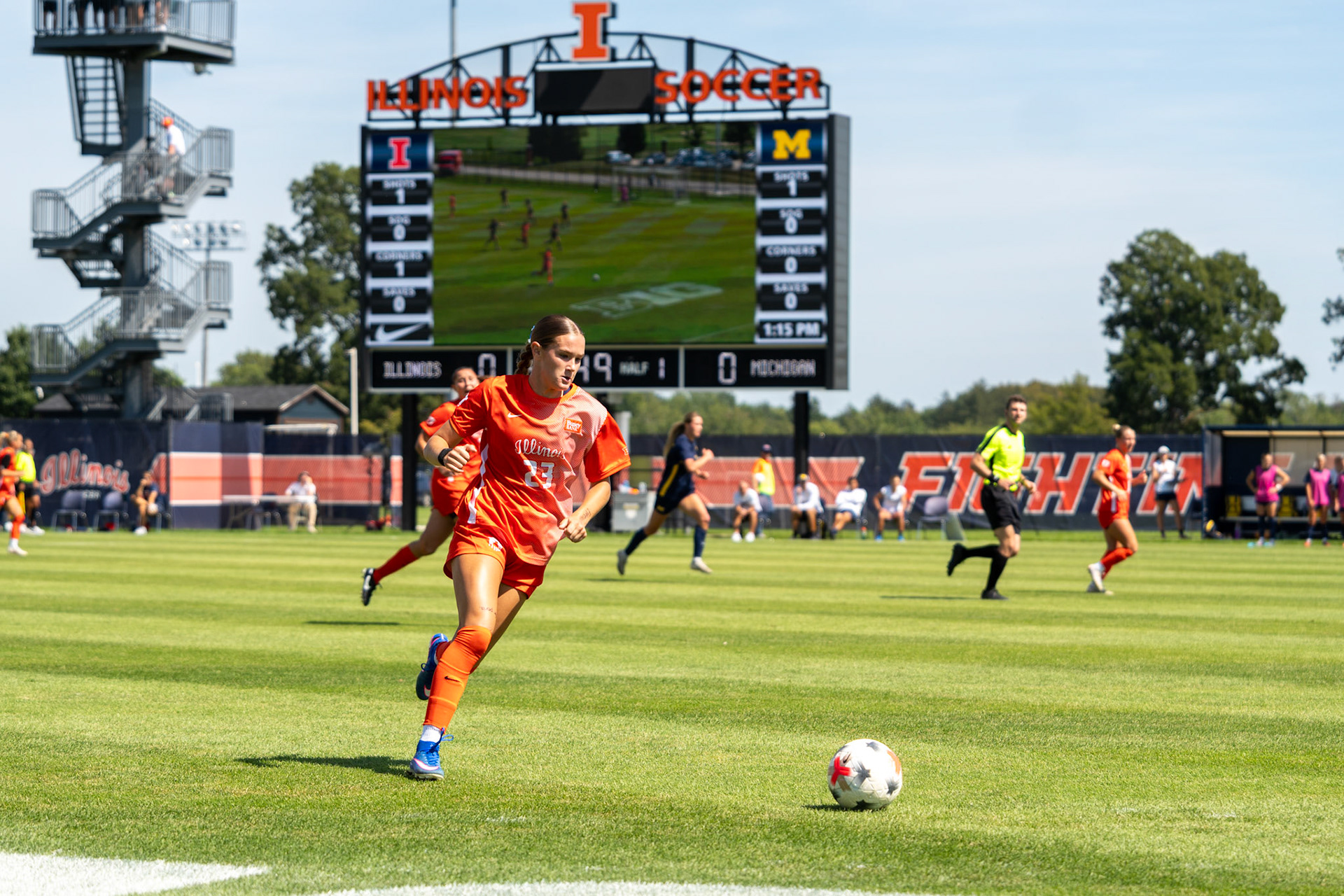 Ashlyn Adams, sophomore forward, scans the field for an open teammate while dribbling against Michigan at Demirjian Park on Sunday. Illinois fell to Michigan 2-0 in the Big Ten matchup.