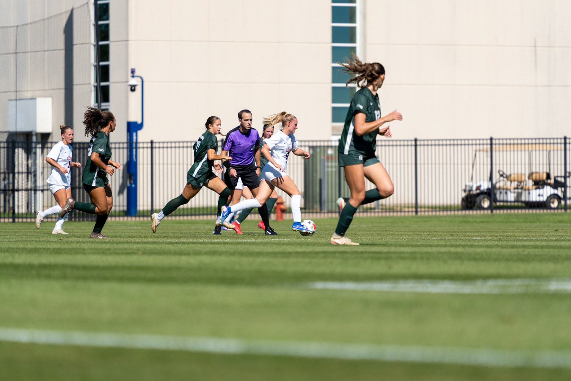 Sophia McMillan, freshman forward/midfielder, advances the ball with Michigan State defenders in pursuit at Demirjian Park on Oct. 4, 2026. Illinois fell 1-0 to No. 2 Michigan State after a late goal in the 85th minute.
