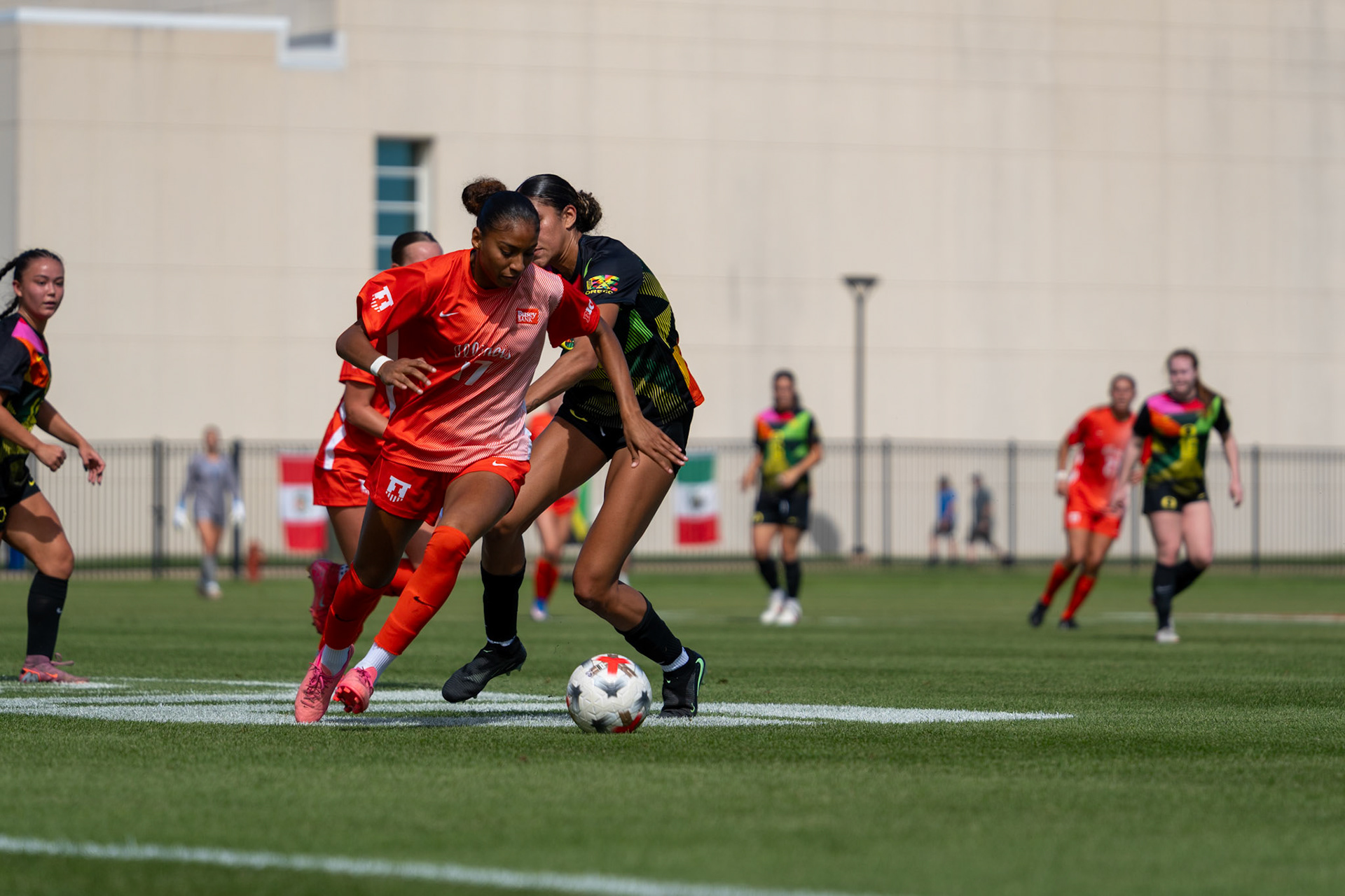 Gabriella Garcia-Terrell, junior forward, weaves past Oregon defenders at Demirjian Park on Sunday. Garcia-Terrell scored the opening goal of the match in the 51st minute assisted by Ashlyn Adams.