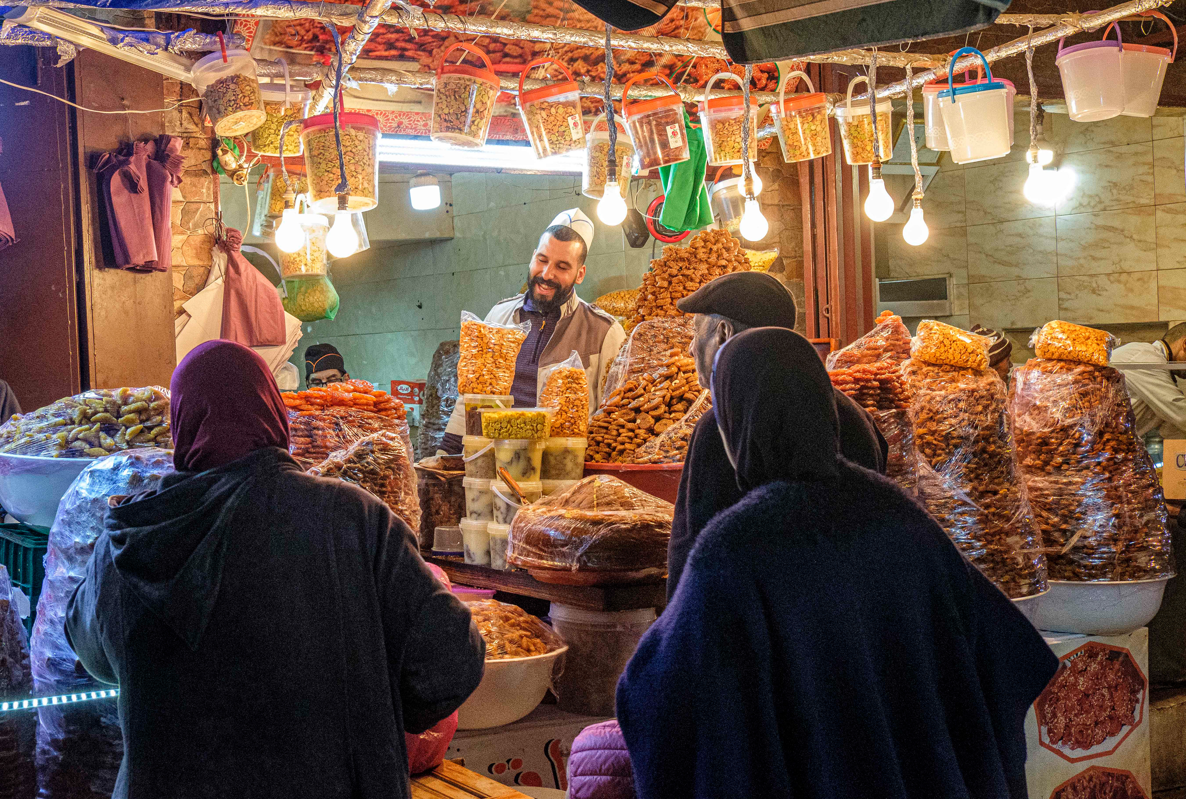 Selling sweets in the souk, Fez, Morocco
