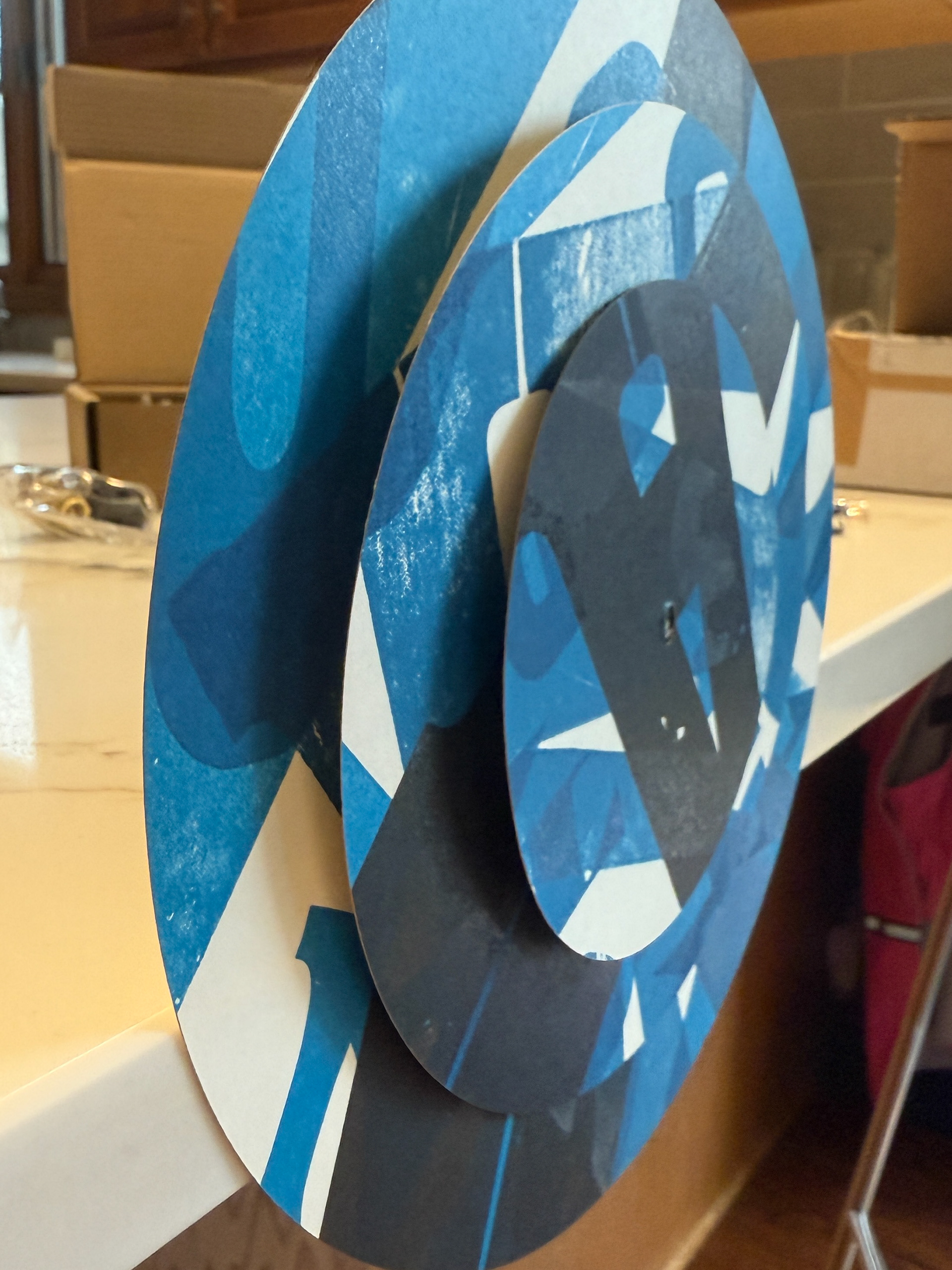 Assembling the layers on the different clock hands