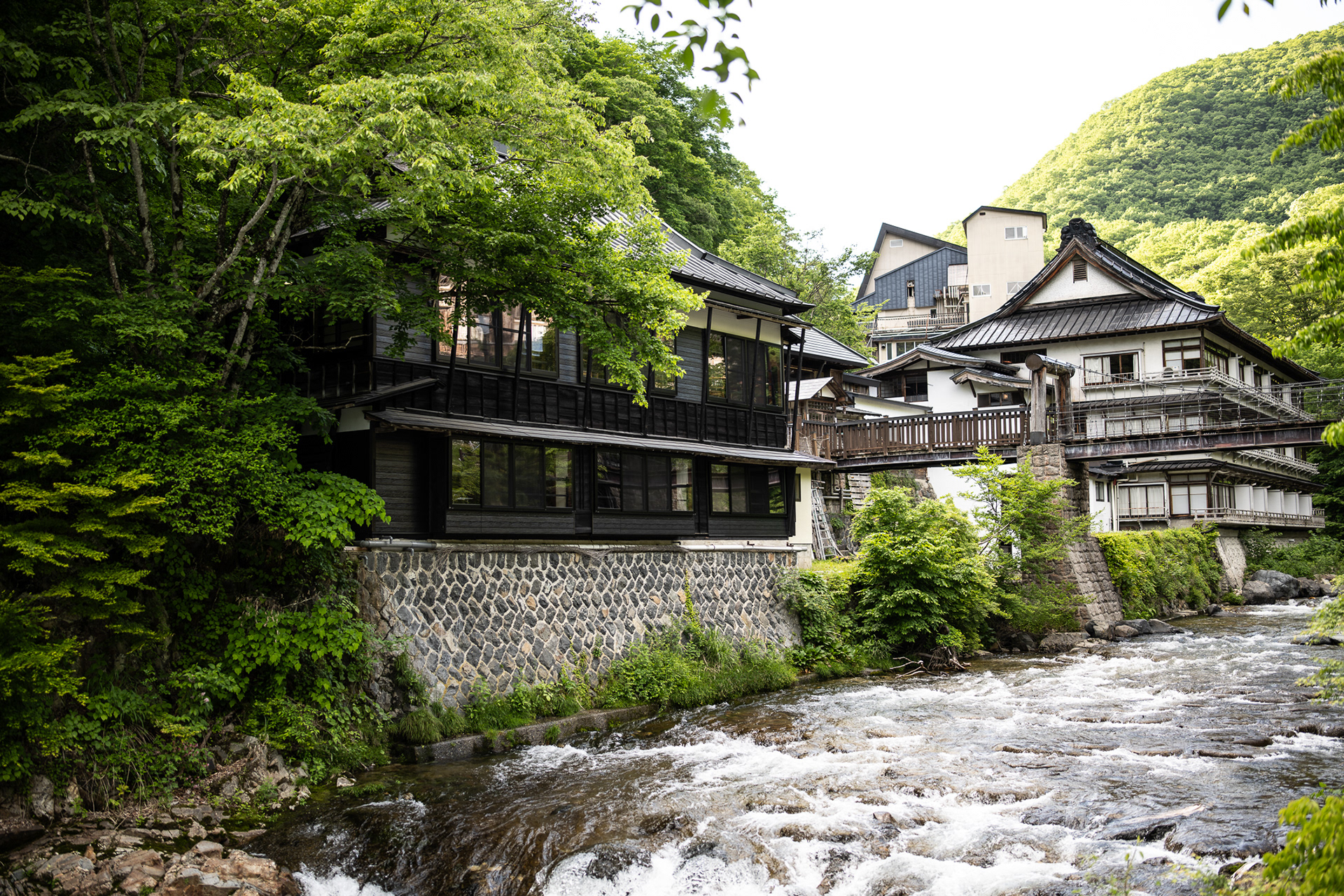 The First Annex, the Main Hall and the suspension bridge at Takaragawa Onsen