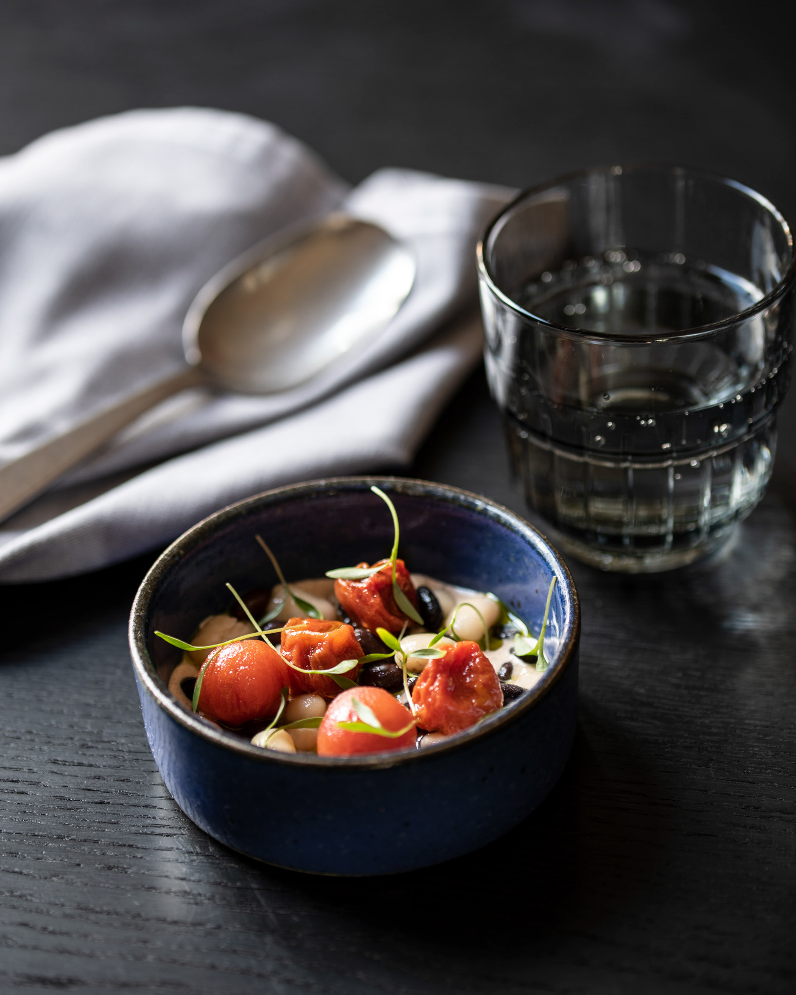 Almond cream, beans and cherry tomatoes - Restaurant Lola in Copenhagen - photo Martin Kaufmann