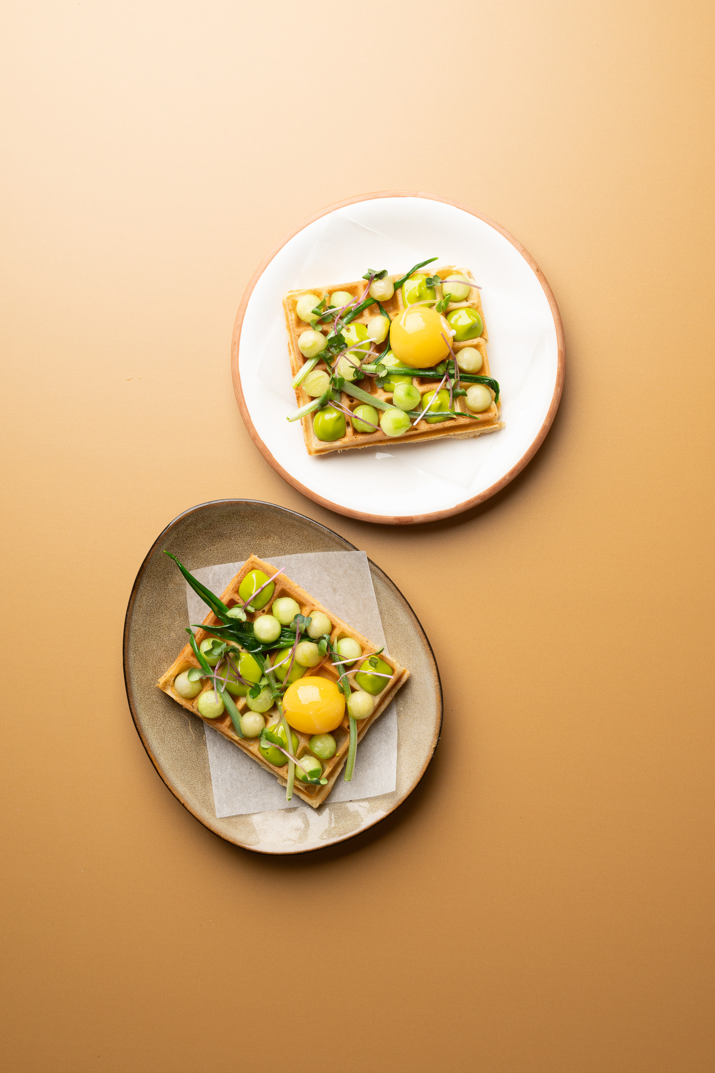 Savory Waffle with Cucumber, Wild Garlic, and Confit Egg Yolk - photo Martin Kaufmann