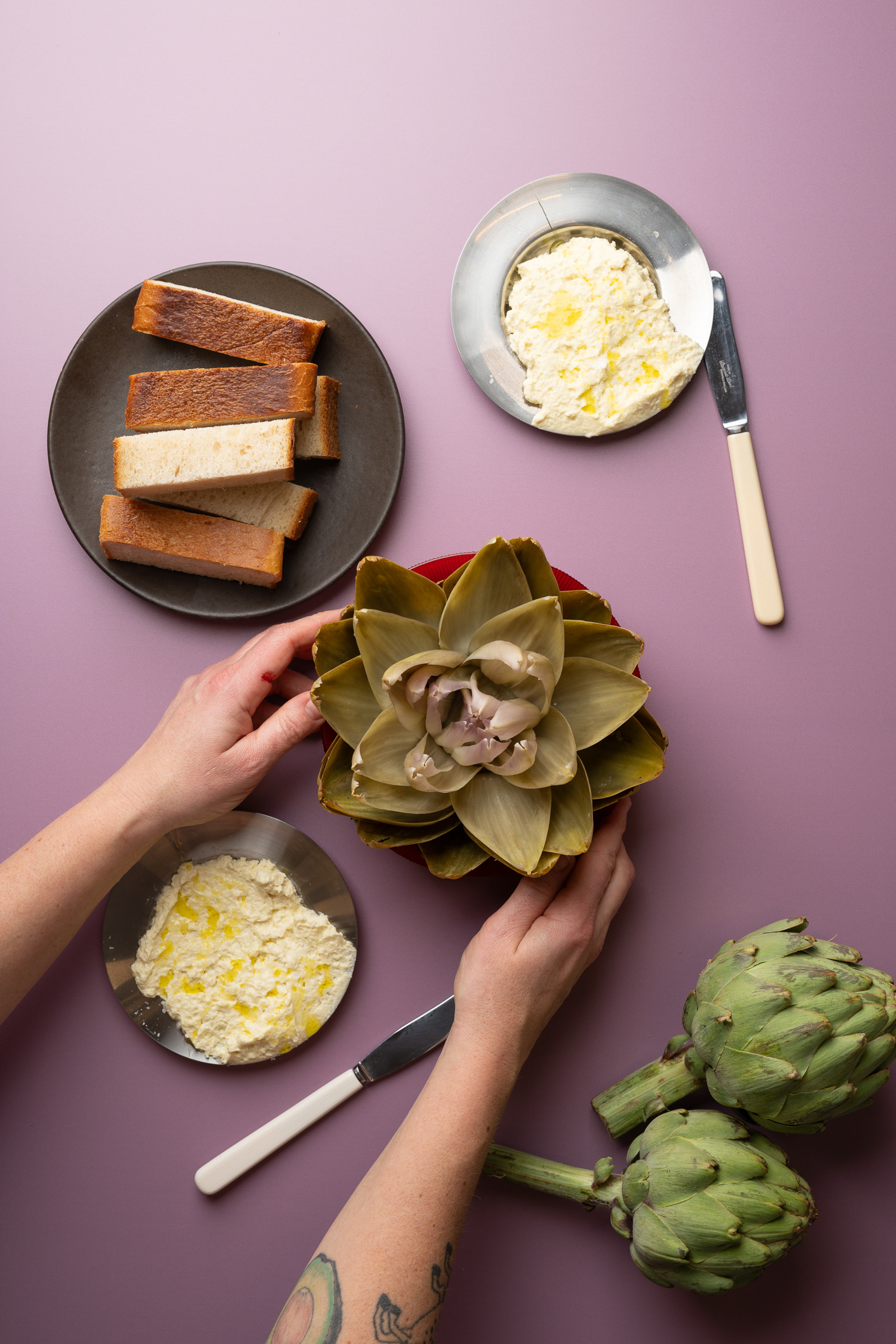 Whole Artichoke with Tomato Butter - photo Martin Kaufmann