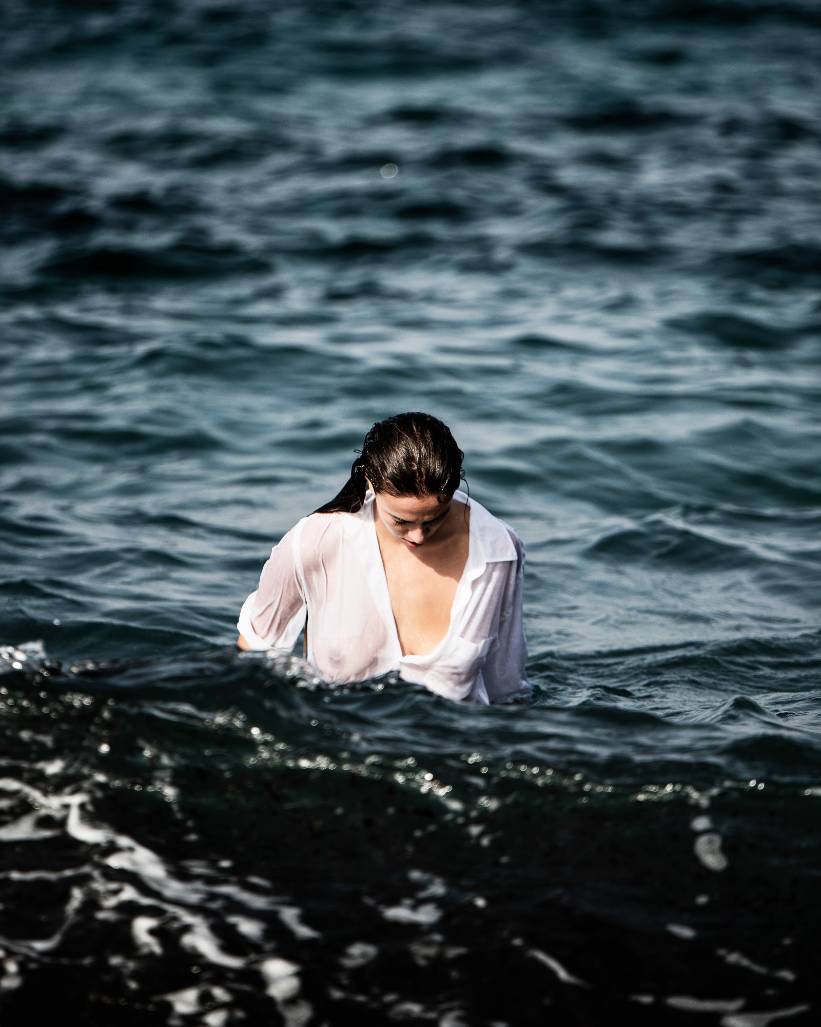 Woman on the beach - from Tinos in Greece - photo Martin Kaufmann