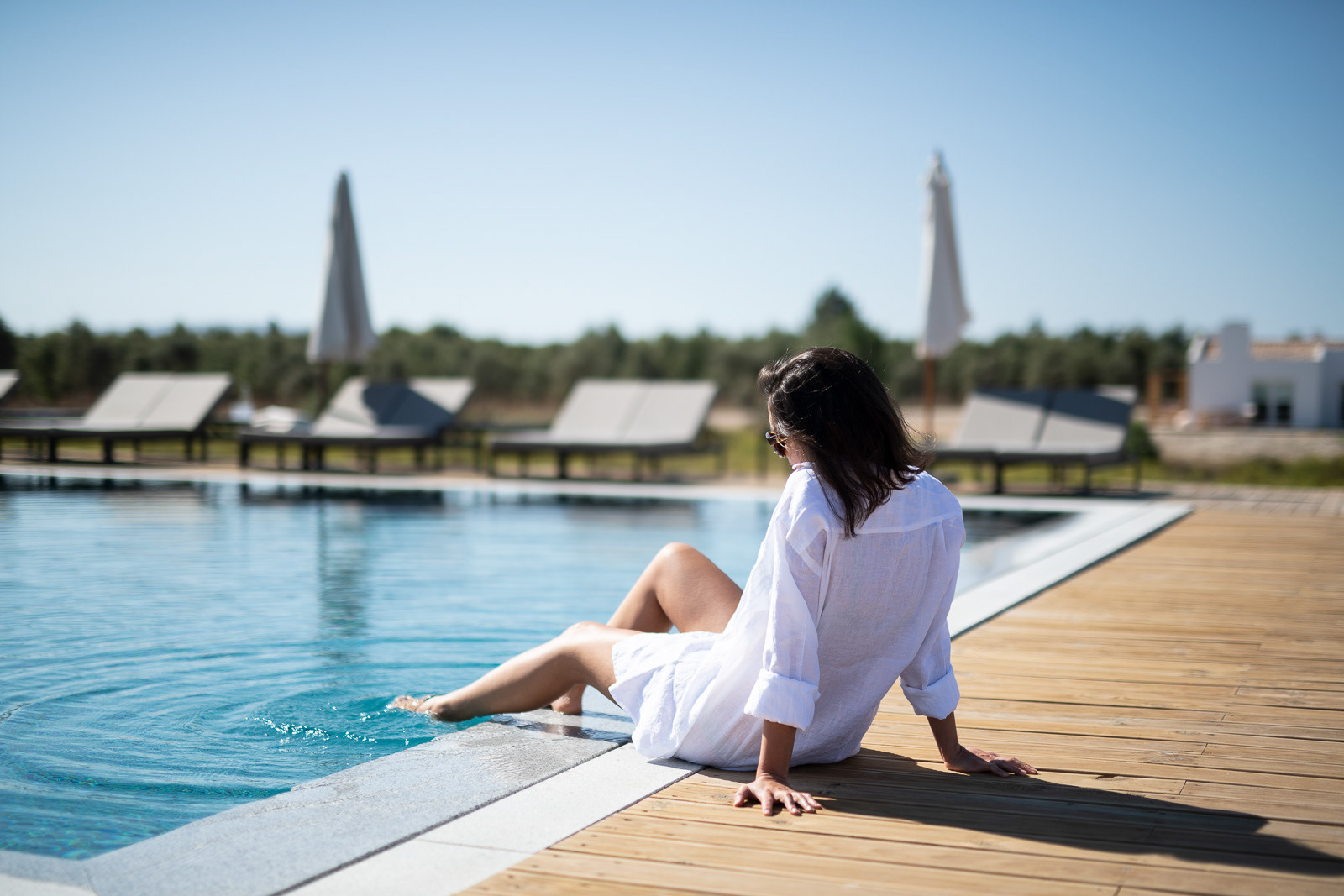 Woman at the pool - Craveiral Farmhouse in Alentejo, Portugal - photo Martin Kaufmann