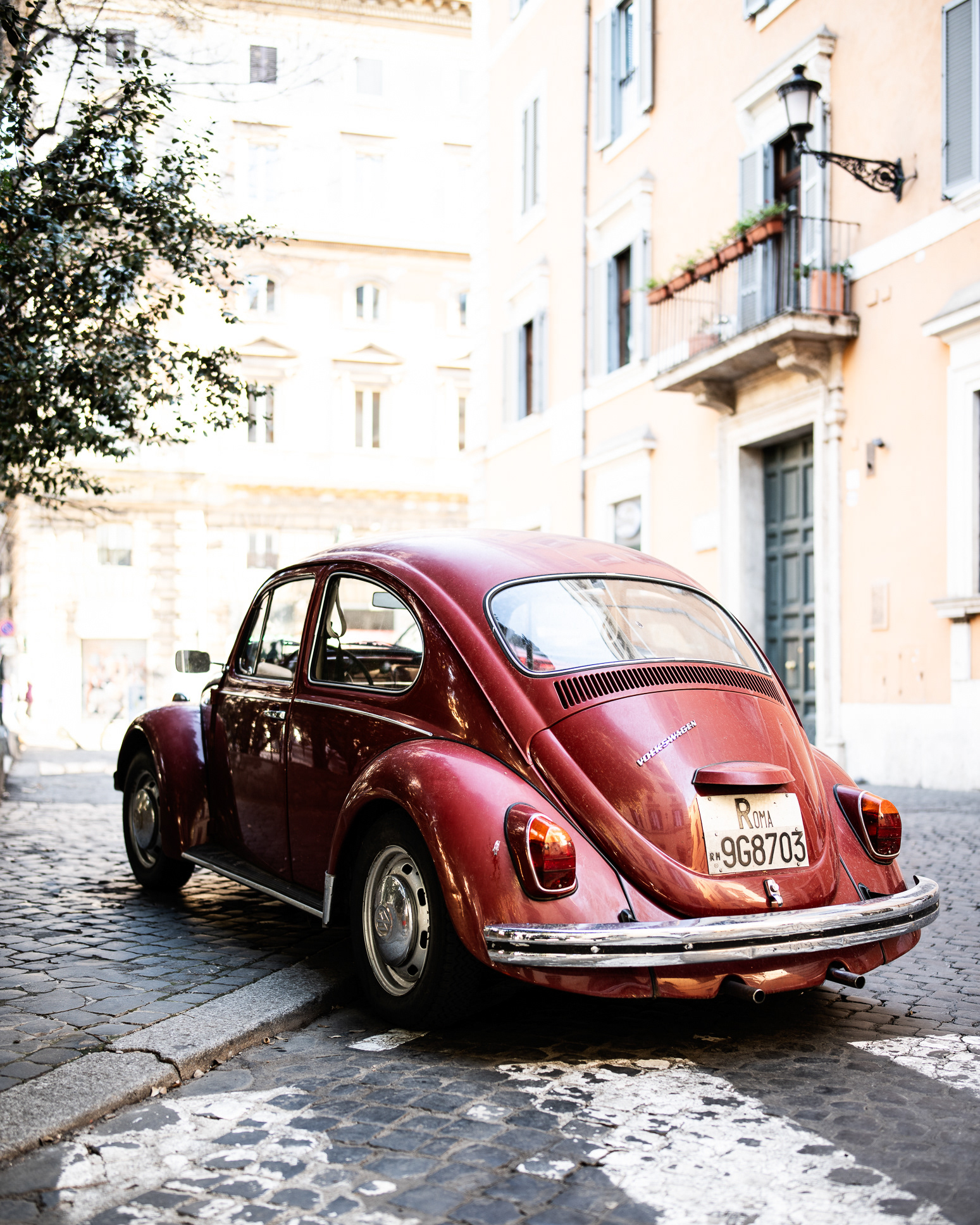 Volkswagen Beetle in a very Roman parking