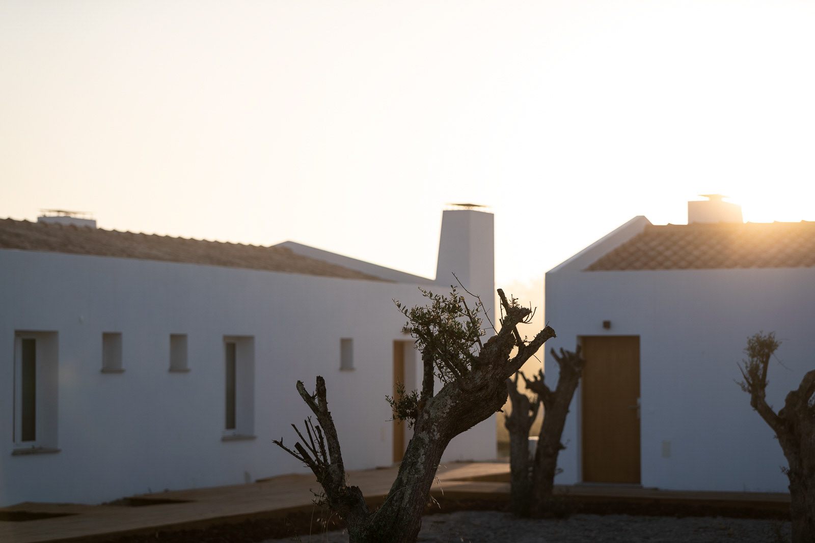 Sunset at the houses - Craveiral Farmhouse in Alentejo, Portugal - photo Martin Kaufmann