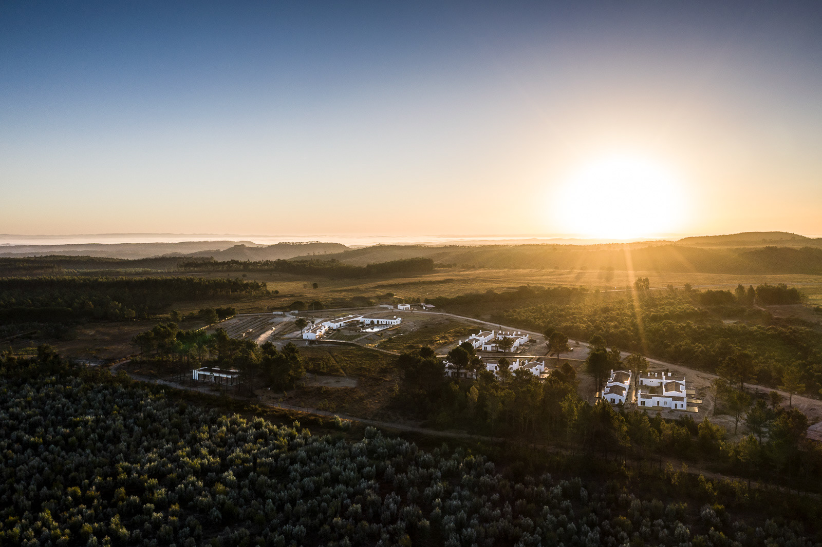 Sunset drone image of the estate - Craveiral Farmhouse in Alentejo, Portugal - photo Martin Kaufmann