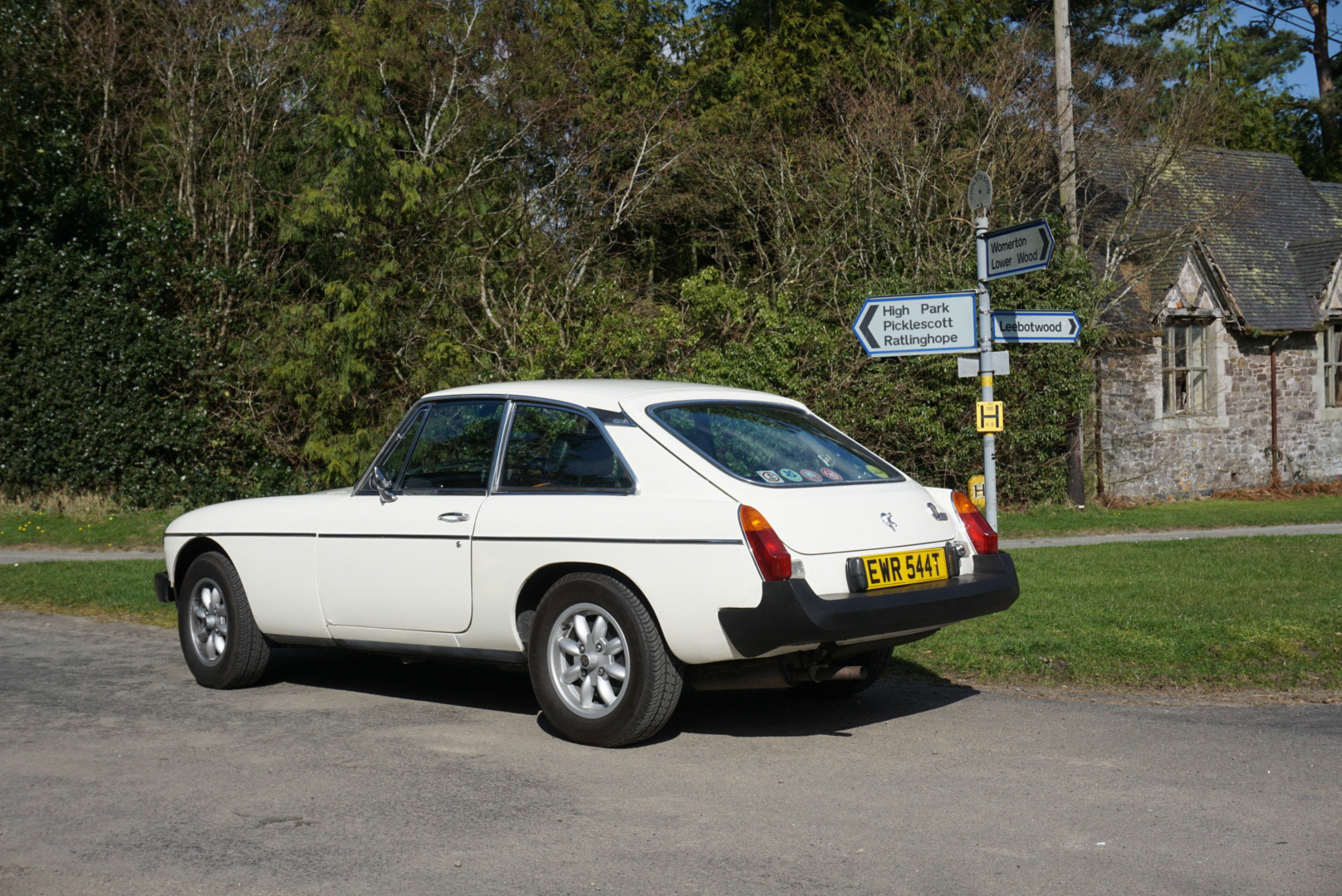MGB GT at the village crossroads