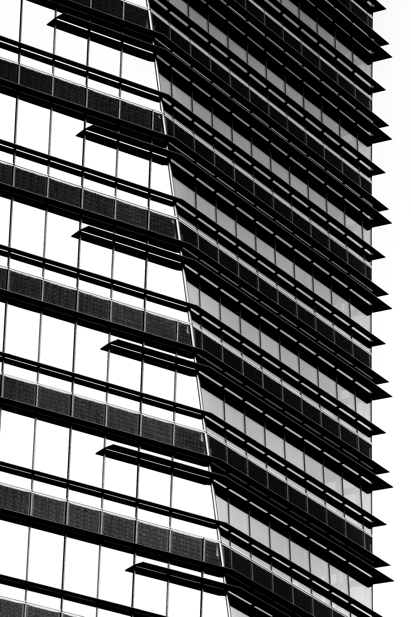 Before moving to Milan (Italy), some years ago, my photos were focused on landscapes. The city of Milan, with its new buildings, inspired me to start to take photos of architecture. But I wanted to experiment, not only take photos of buildings, so I started this series, which is a combination of architecture and abstract. It's not important which building is it, but what it conveys to the viewer.