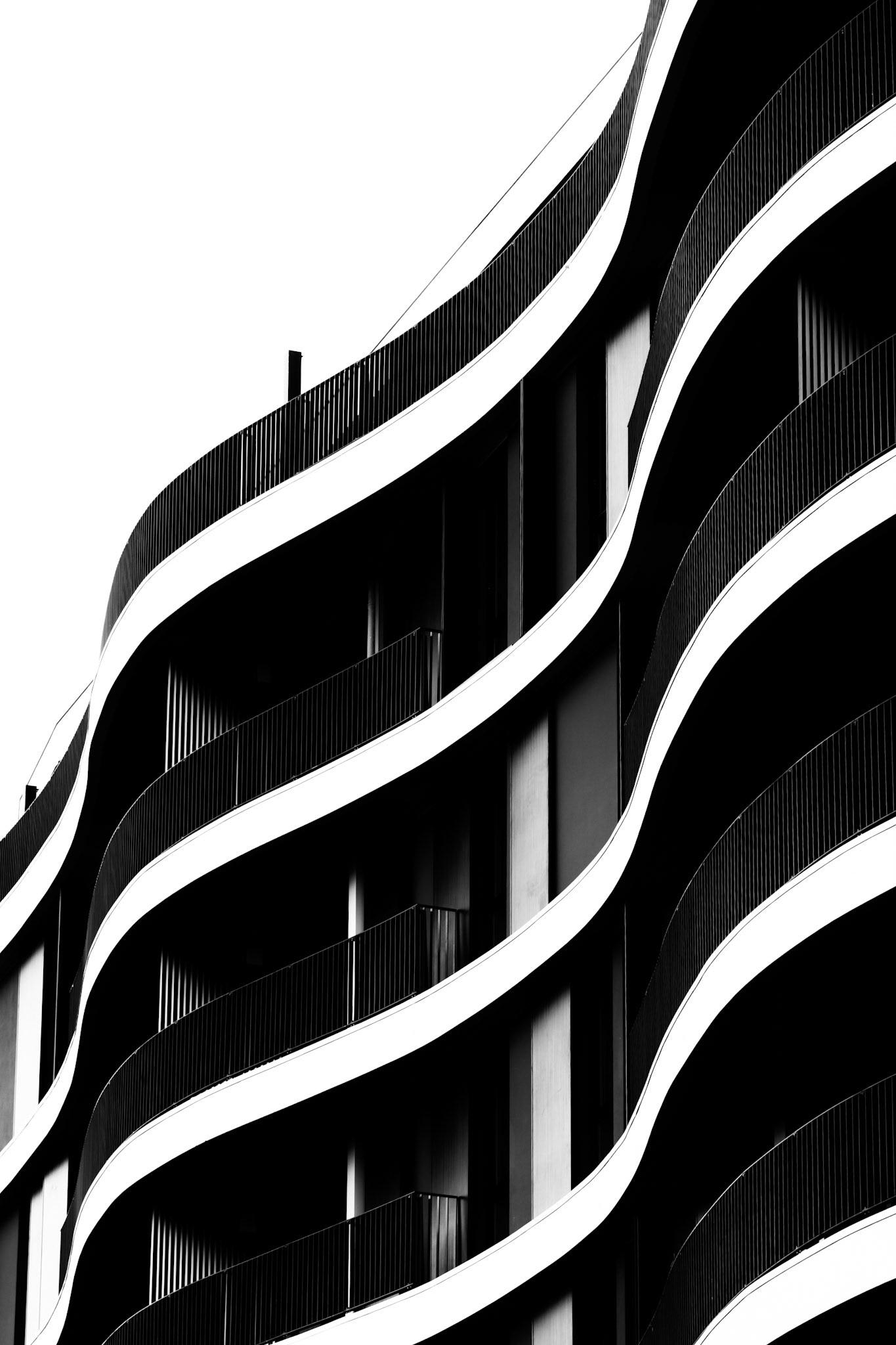 Before moving to Milan (Italy), some years ago, my photos were focused on landscapes. The city of Milan, with its new buildings, inspired me to start to take photos of architecture. But I wanted to experiment, not only take photos of buildings, so I started this series, which is a combination of architecture and abstract. It's not important which building is it, but what it conveys to the viewer.