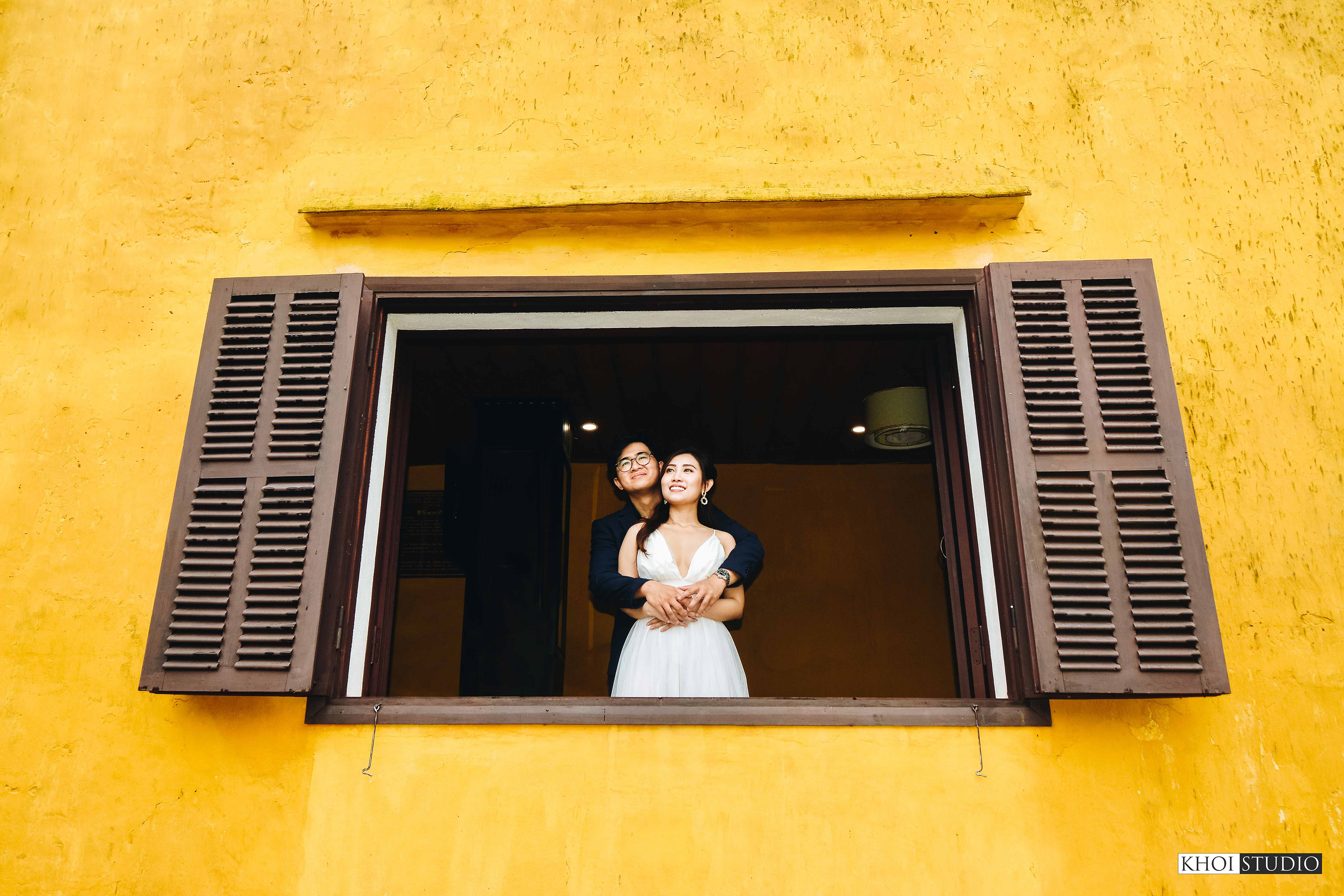 Couple photoshoot in the rainy season in Hoi An ancient town | Couple from Saigon