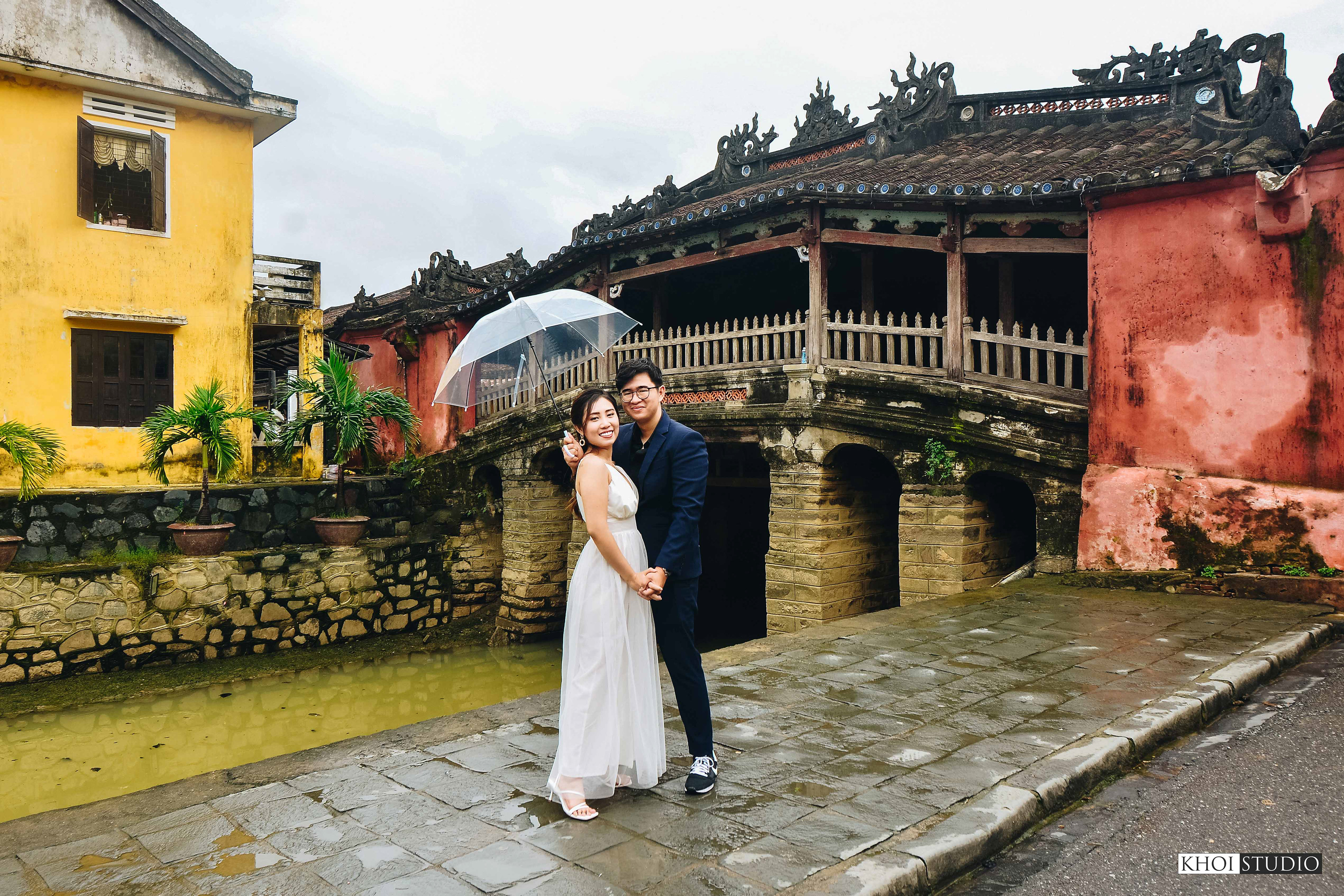 Couple photoshoot in the rainy season in Hoi An ancient town | Couple from Saigon