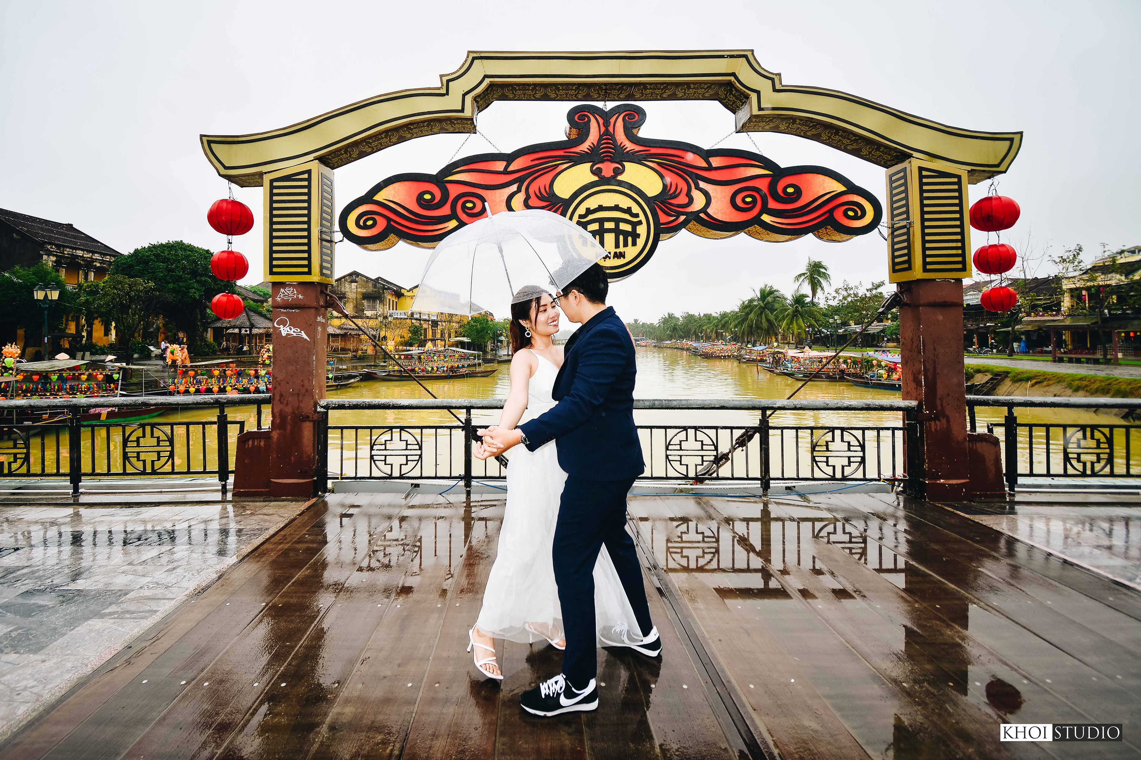 Couple photoshoot in the rainy season in Hoi An ancient town | Couple from Saigon