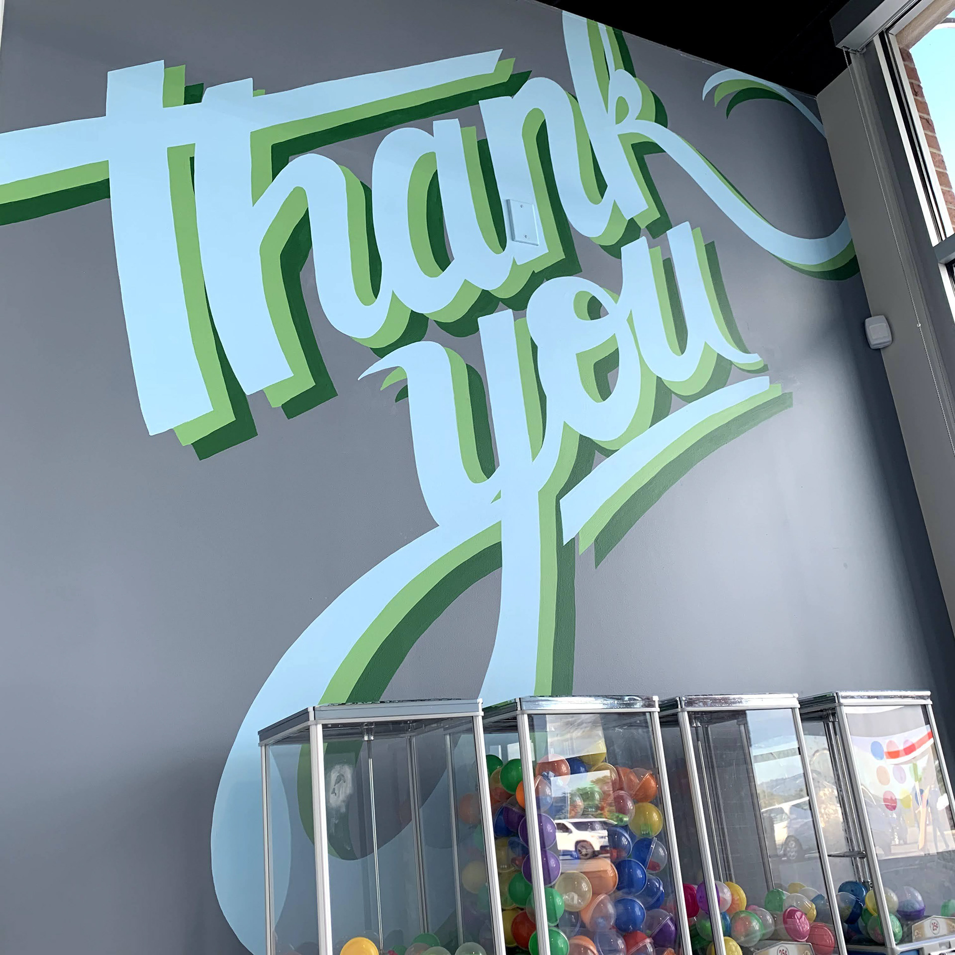 Experiential mural element with brand colors
