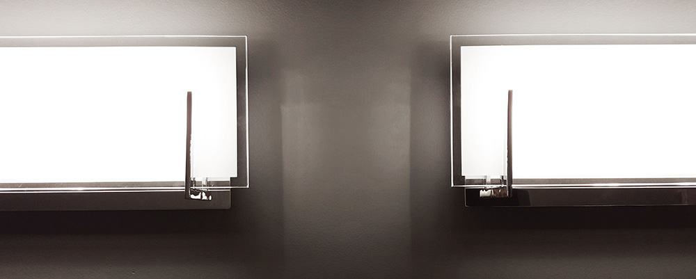 Header image - abstract photo of two rectangular lights side by side