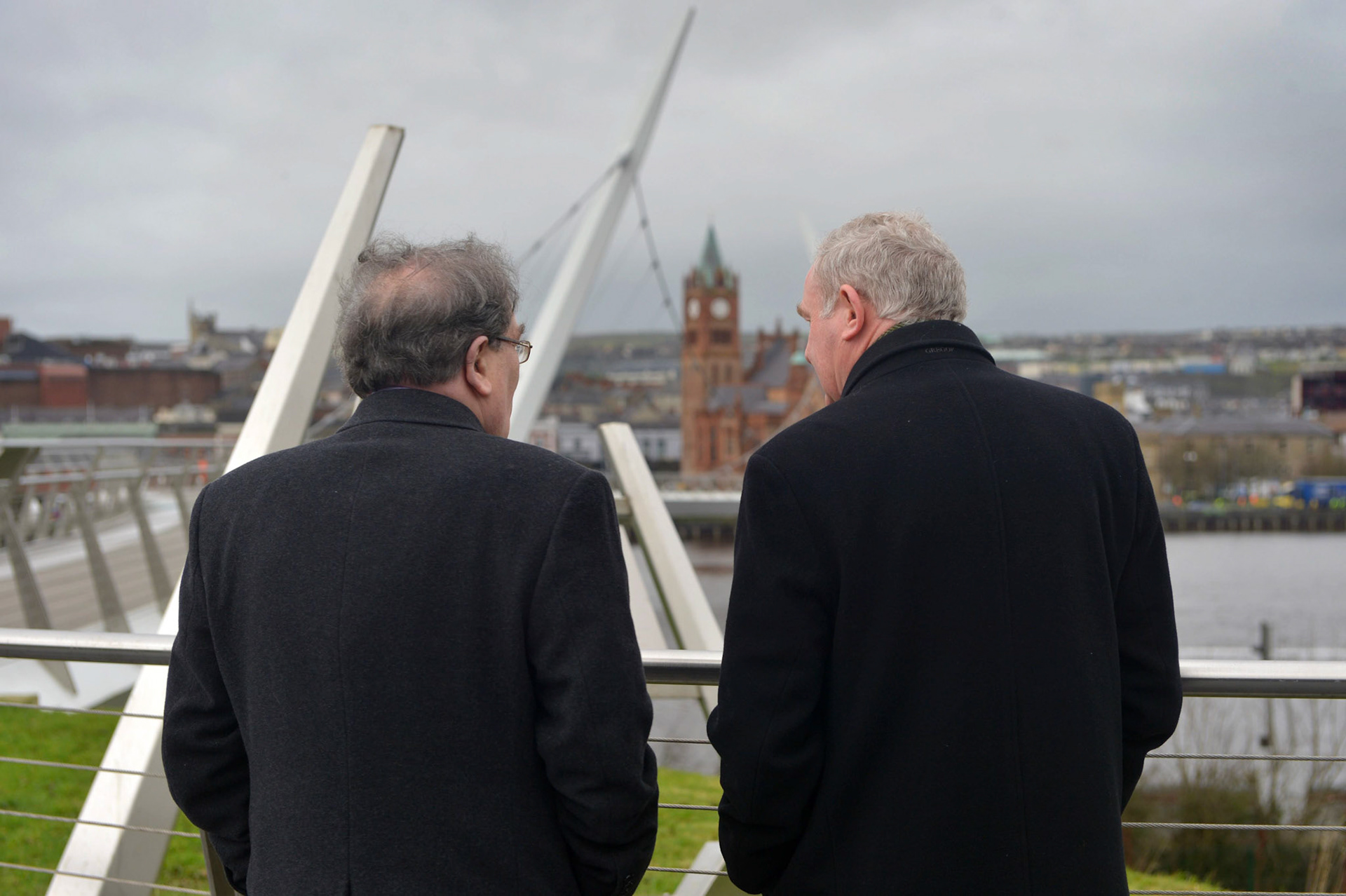John Hume and Deputy First Minister Martin McGuinness look out over the Derry Peace Brige and the Guild Hall.Photo by Aaron McCracken