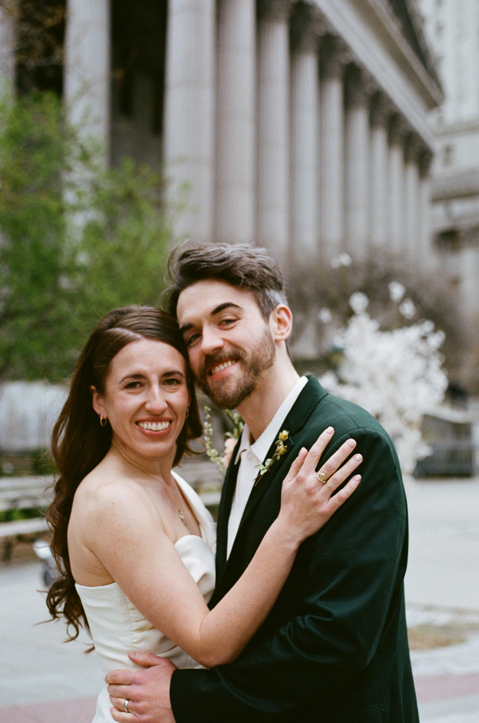35mm film portrait of a couple at City Hall park after their wedding ceremony