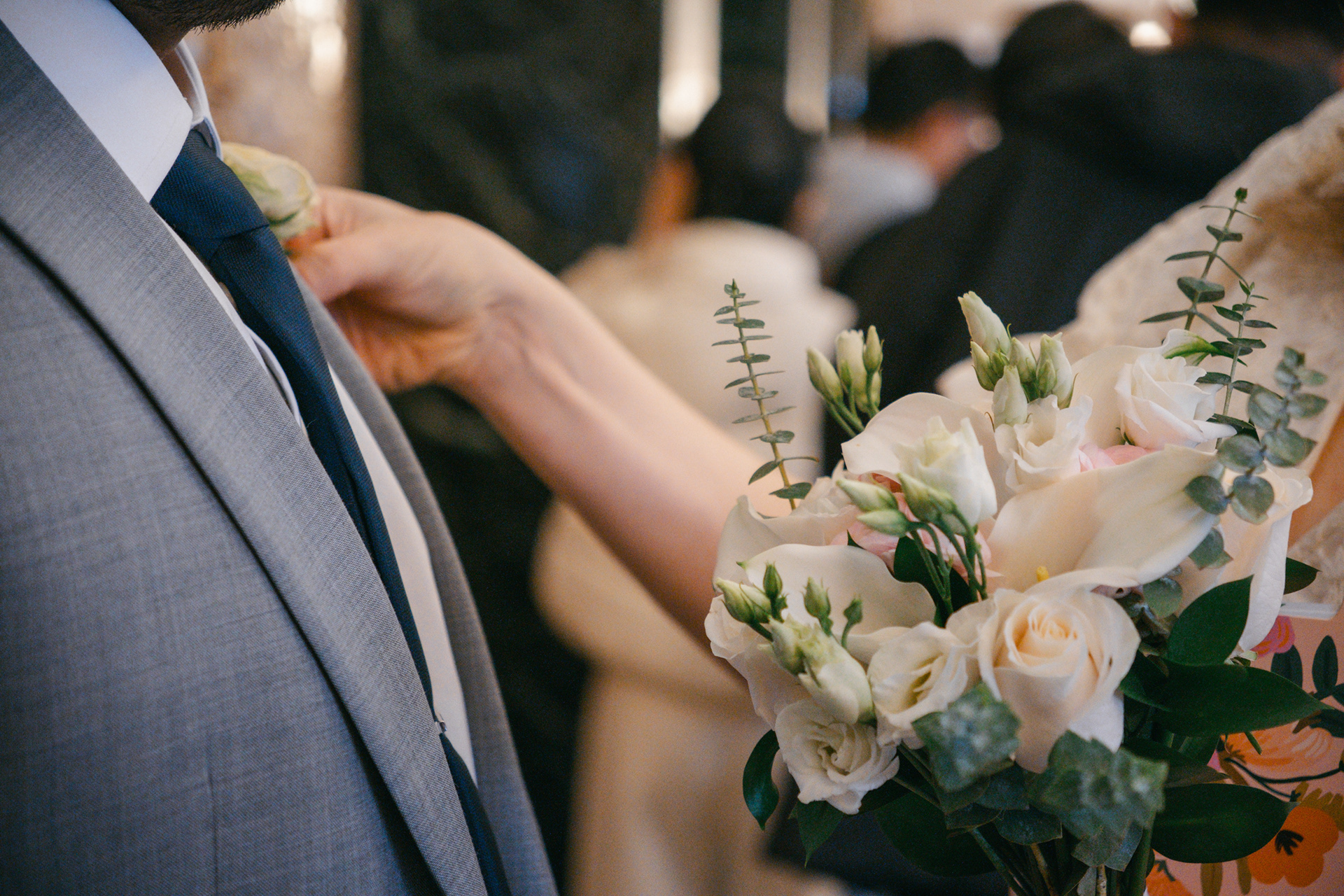 Candid photo of a couple getting ready for a City Hall Wedding Ceremony