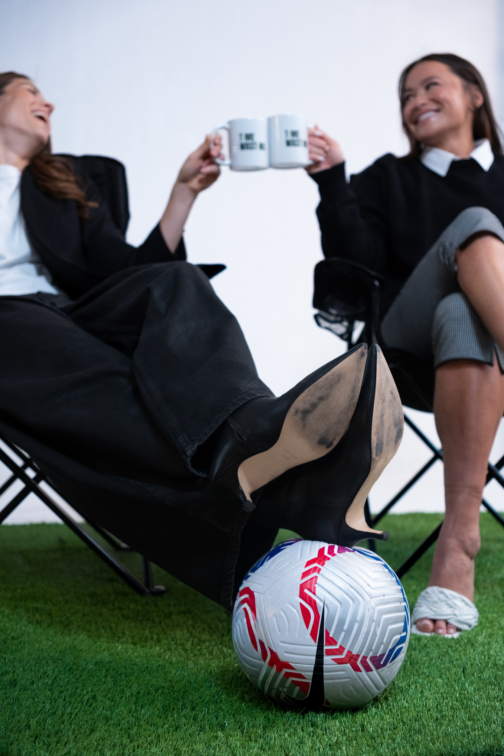 Documentary style branding photography session with podcast hosts Kelley O’Hara and Ali Riley