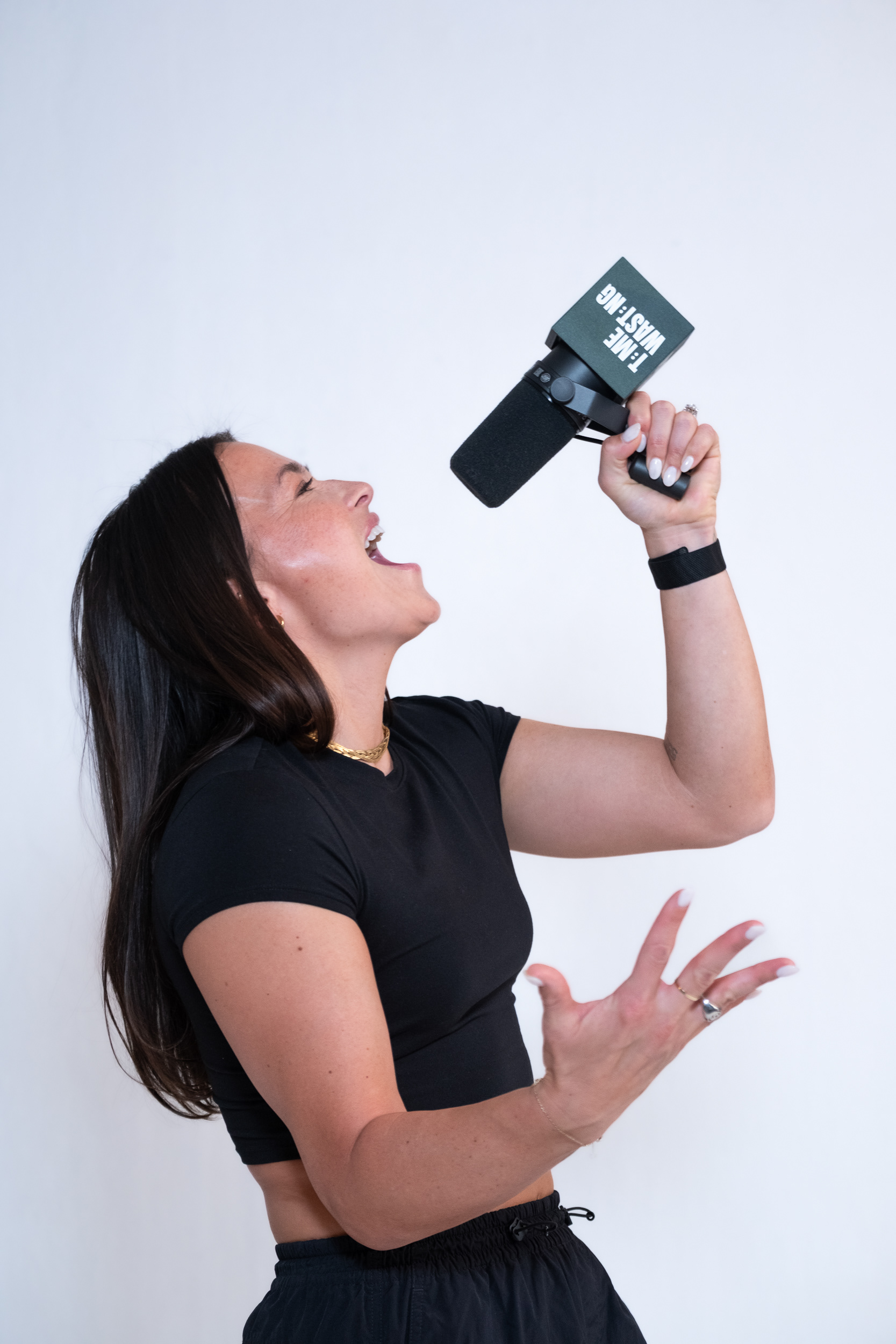 Podcast host Ali Riley in a studio photoshoot