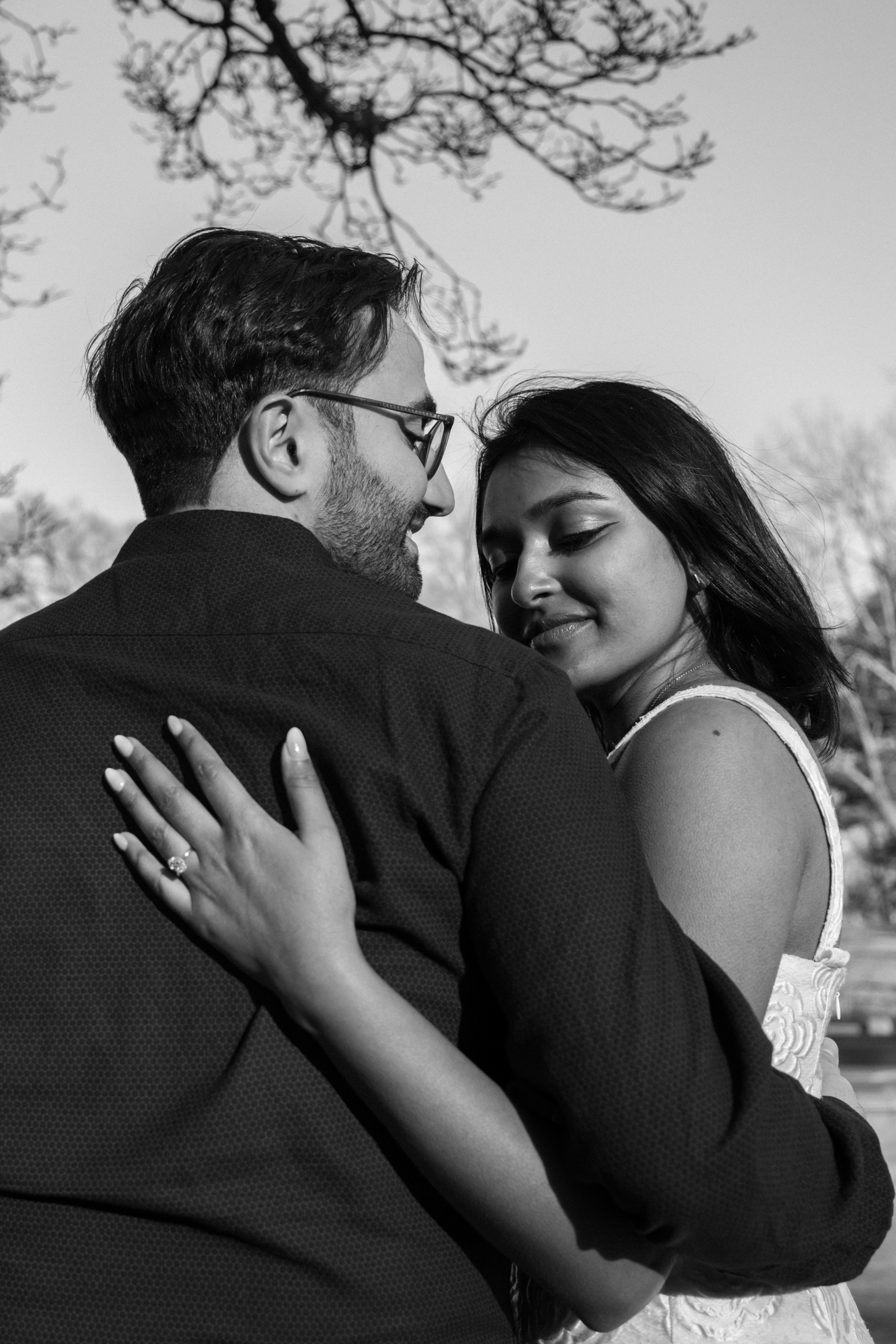 Black and white portrait of a couple during an engagement session in Central Park
