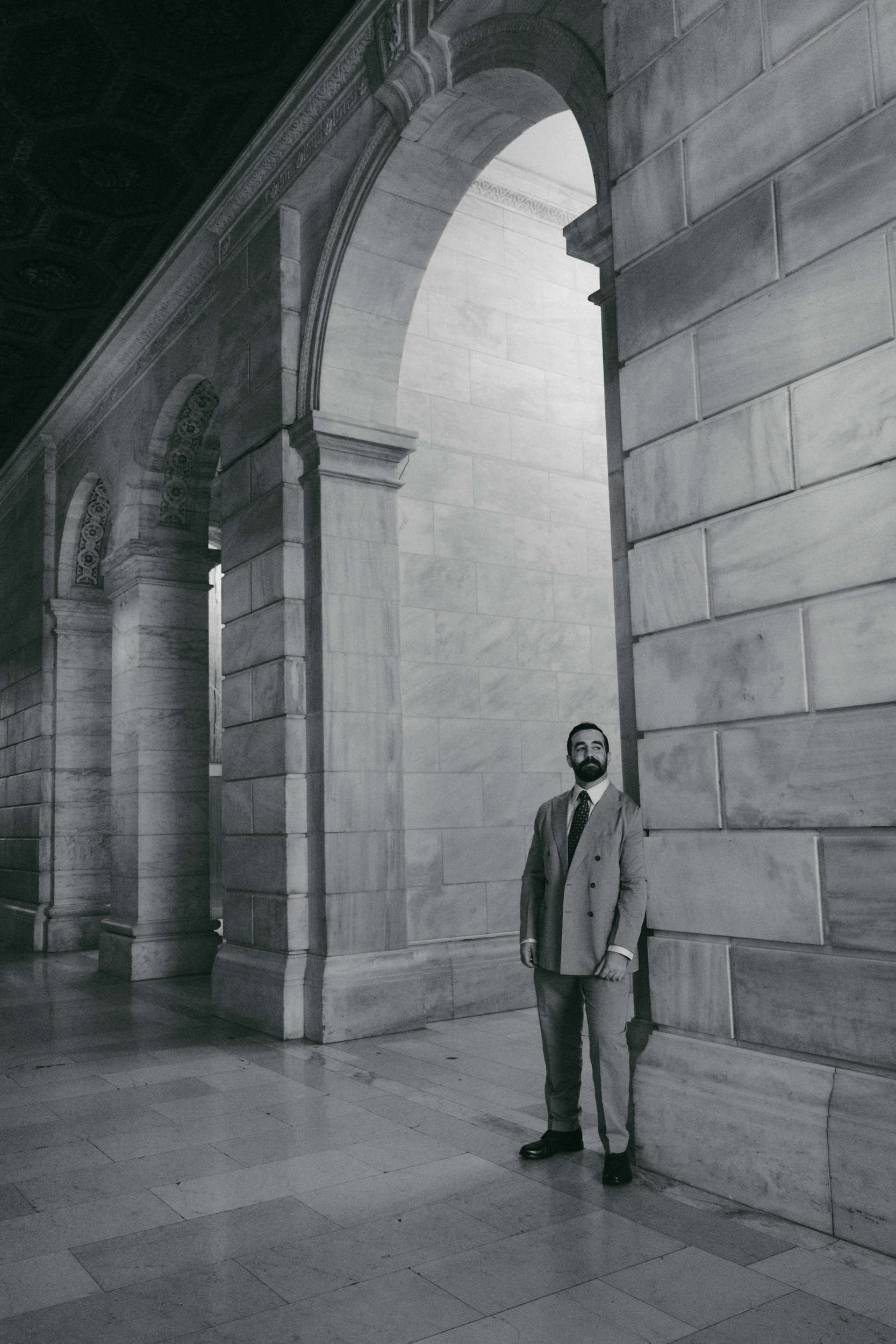 Lawyer posing for a branding photography session at the New York Public Library