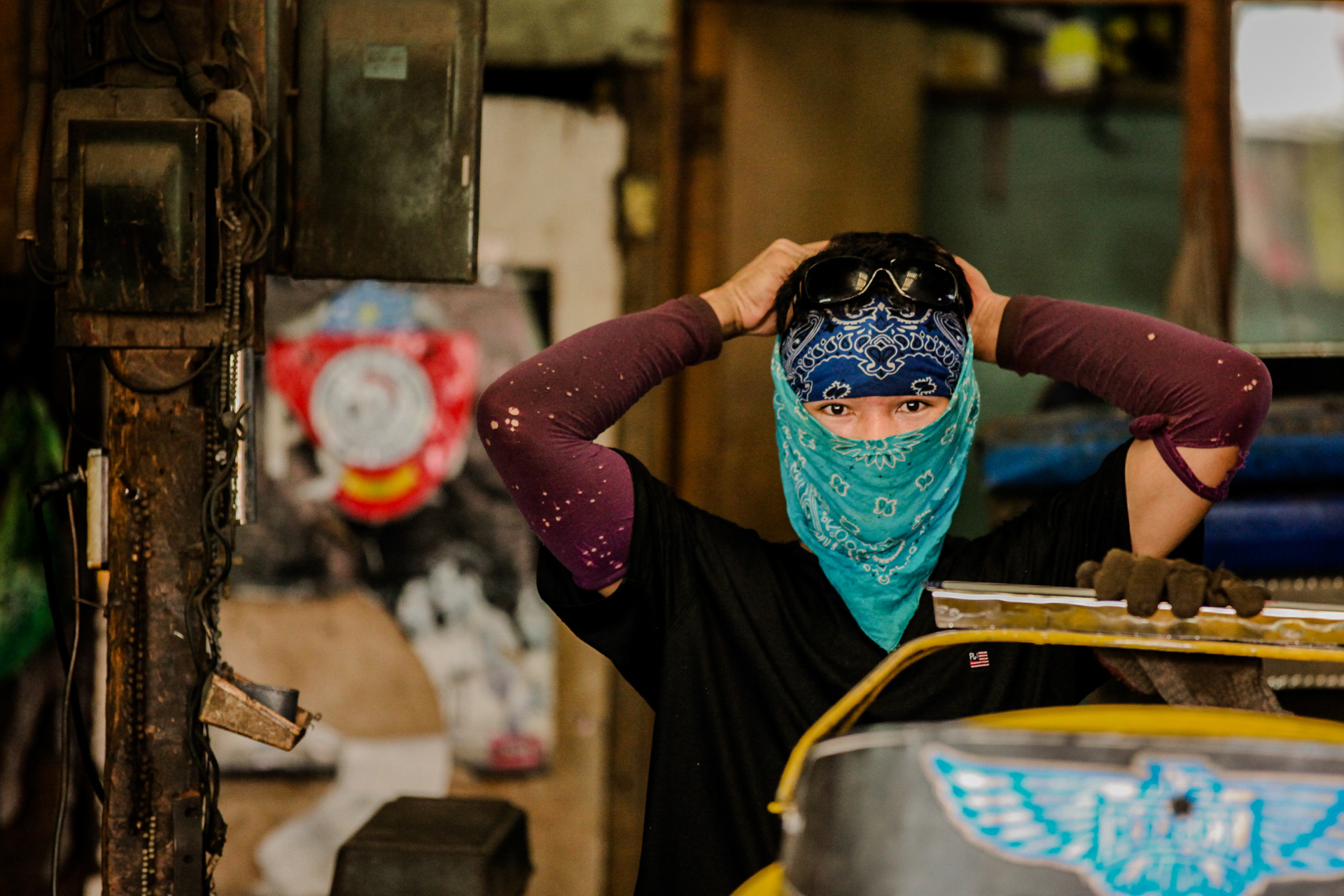 A worker in the trike shop.