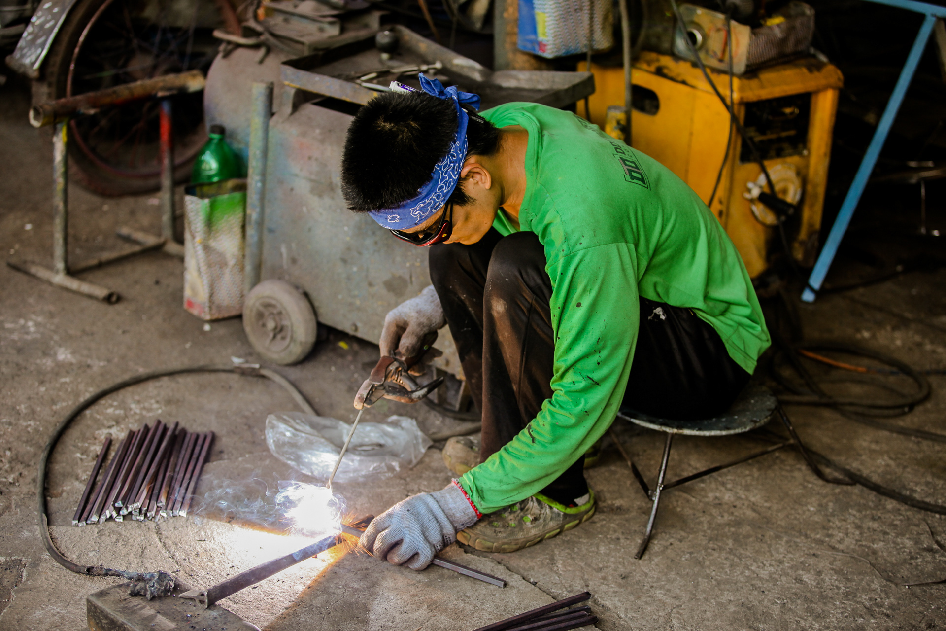 A worker in the trike shop.