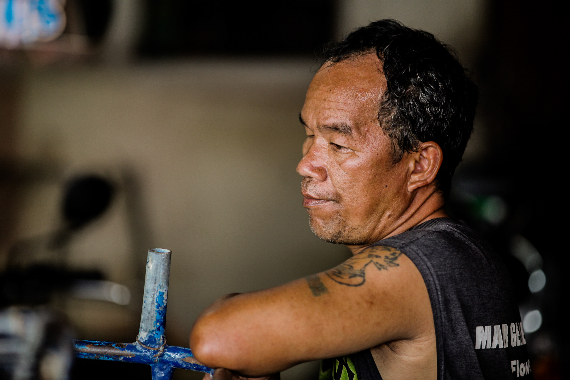 A worker in the trike shop.
