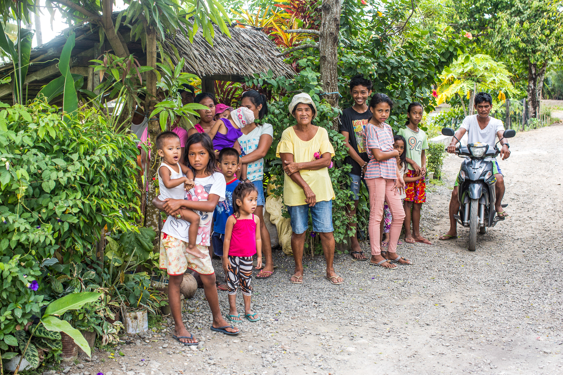 Part of a curious group of locals coming to check out the commotion.