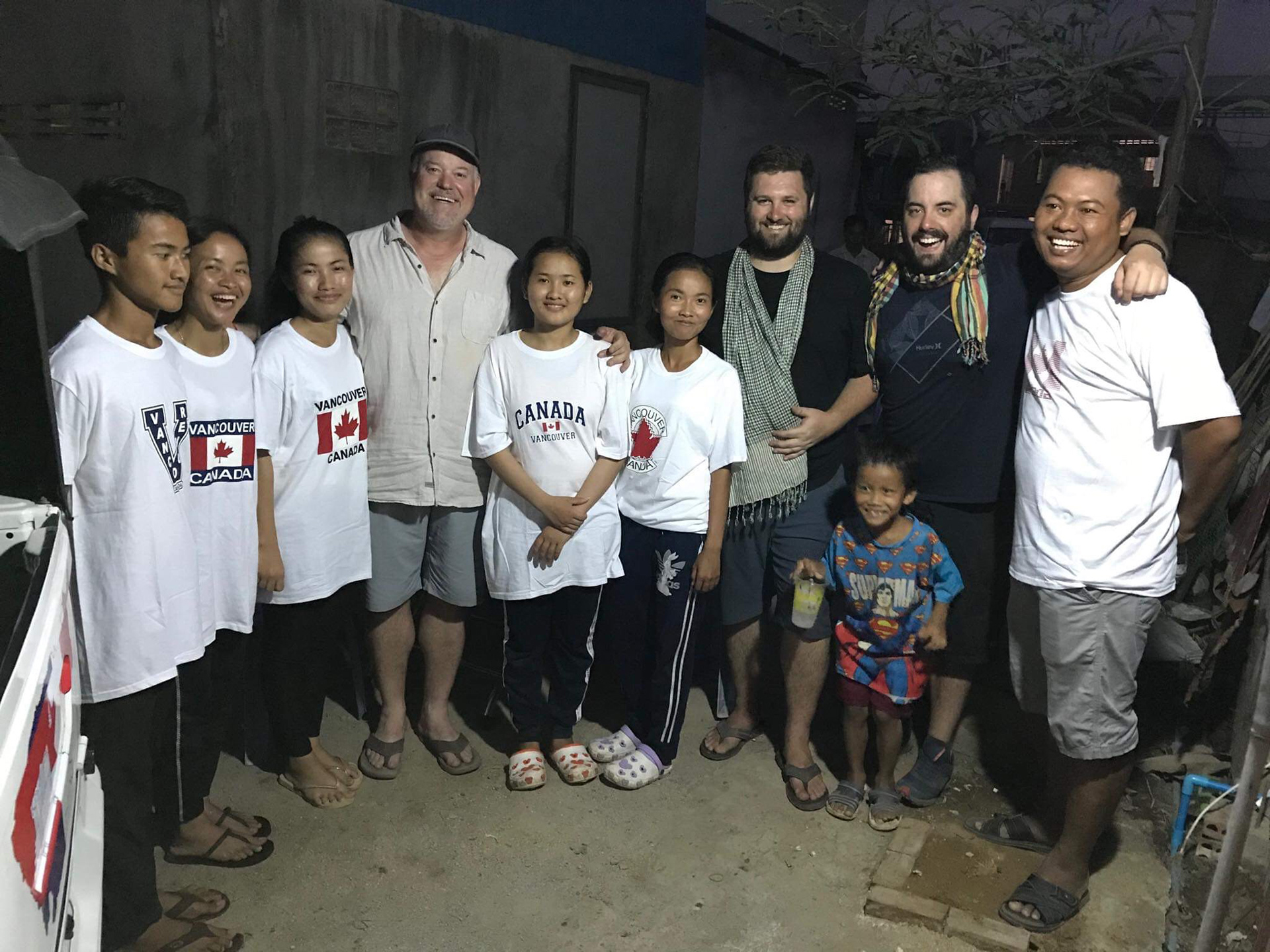 Following a long journey of over 1200 kilometers and 14 days, the Detours crew celebrates with the Hov children and the owner of their Andong village school, An Li.